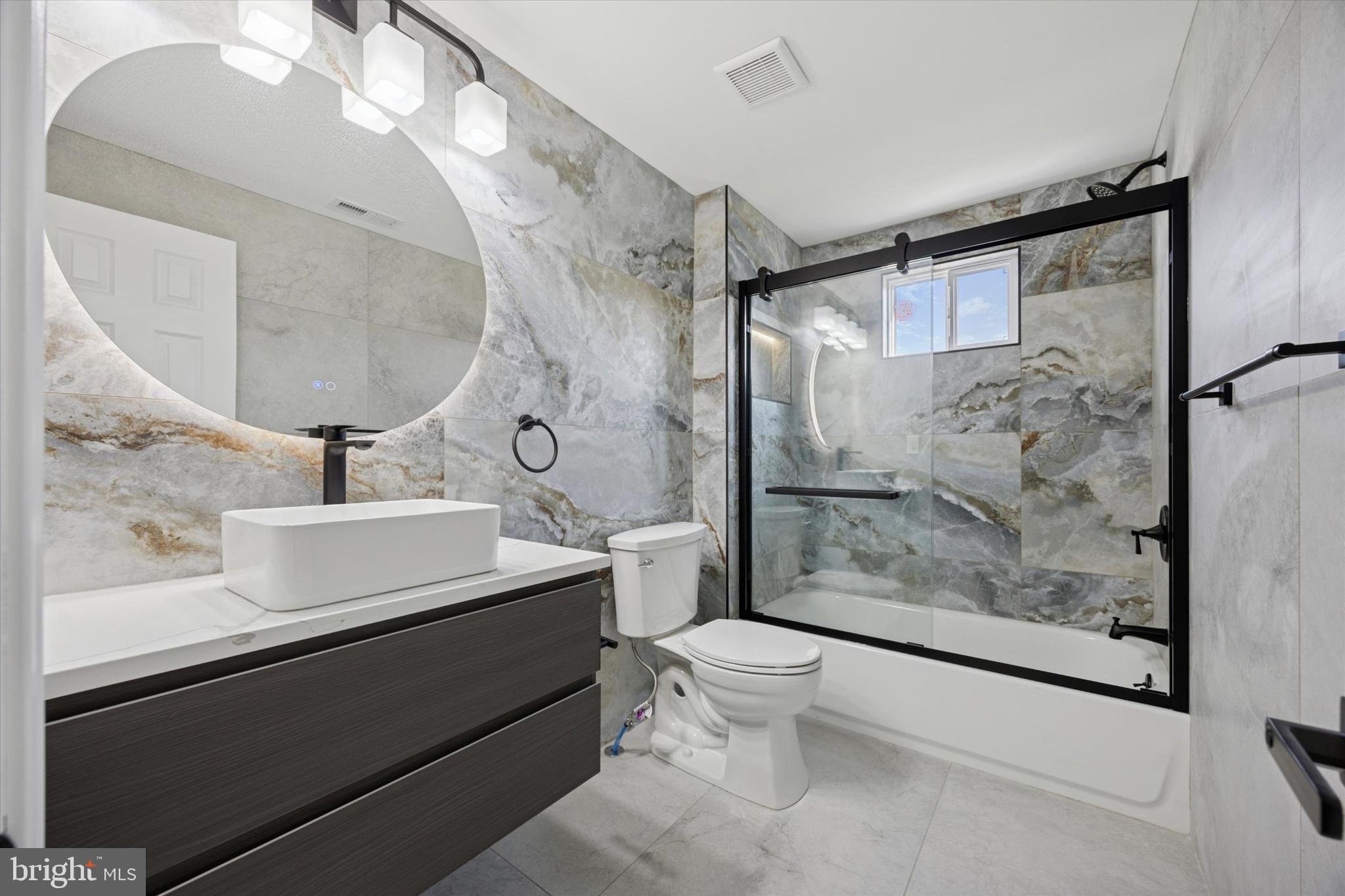 1574 Deer Run Road Warminster, PA 18974 - Photo 30 of 37 a bathroom with a sink a toilet and shower