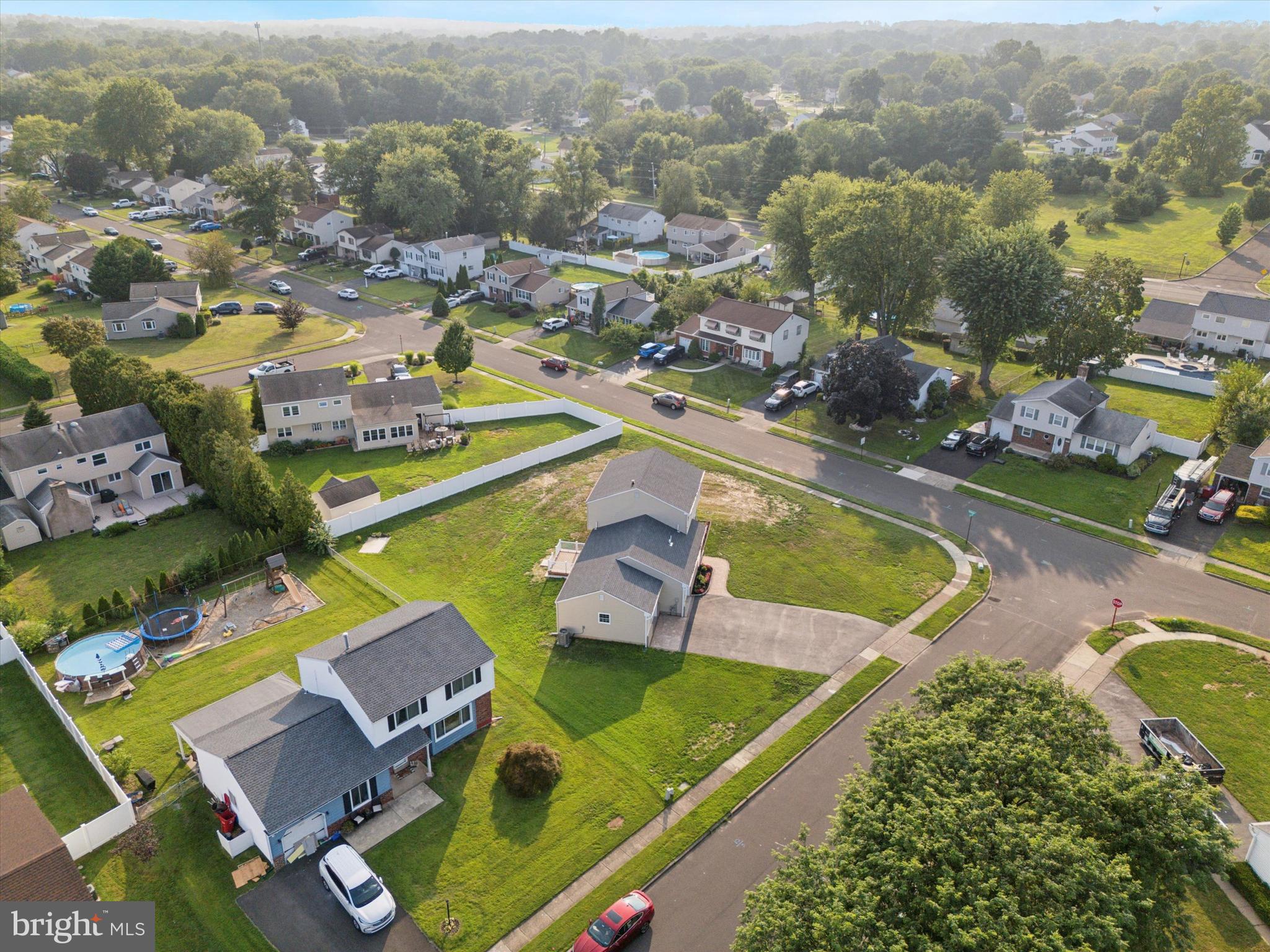 1574 Deer Run Road Warminster, PA 18974 - Photo 36 of 37 an aerial view of a house with a swimming pool yard and outdoor seating