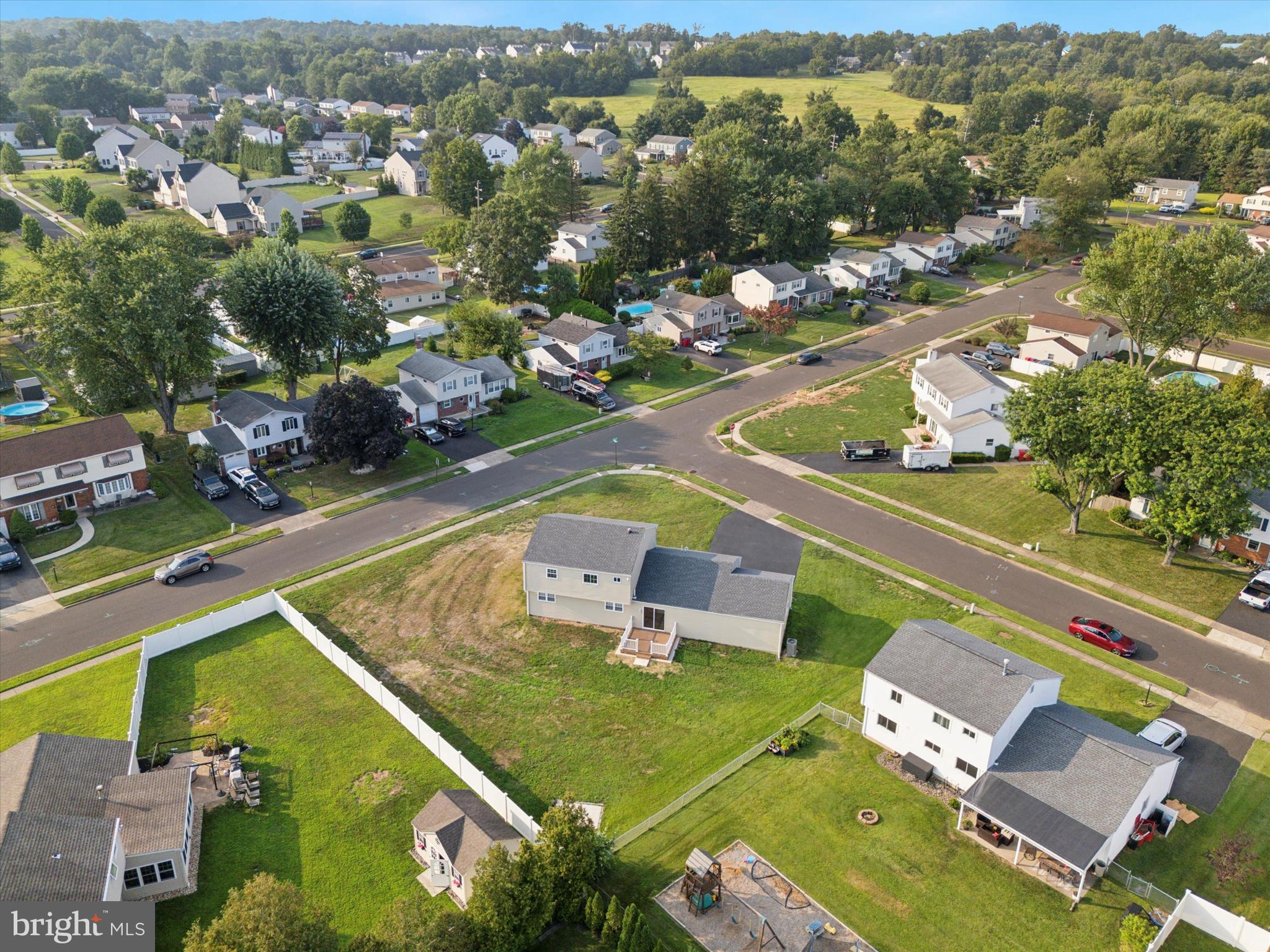 1574 Deer Run Road Warminster, PA 18974 - Photo 37 of 37 an aerial view of a house with a swimming pool yard and outdoor seating