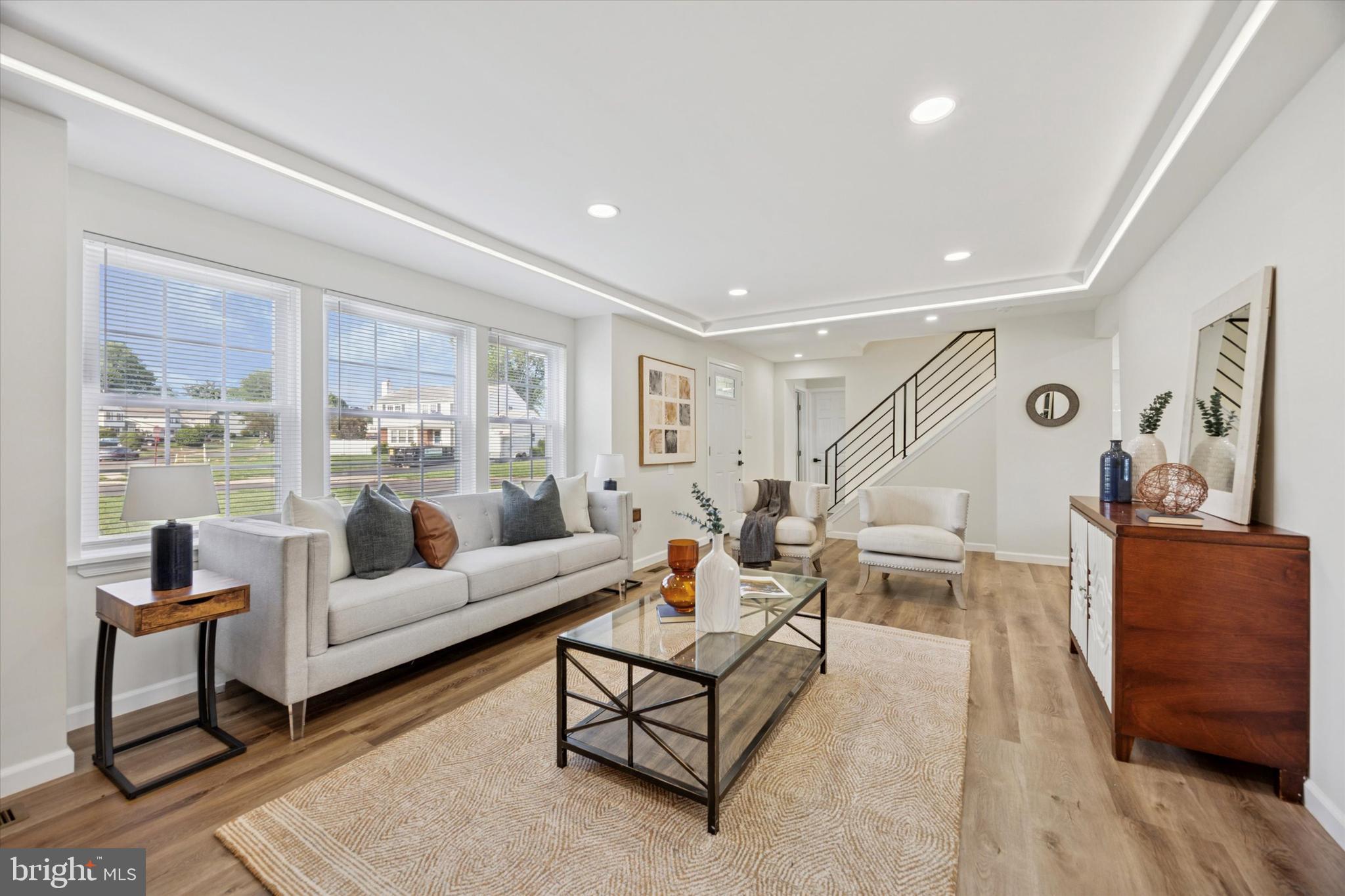 1574 Deer Run Road Warminster, PA 18974 - Photo 6 of 37 a living room with furniture and a large window