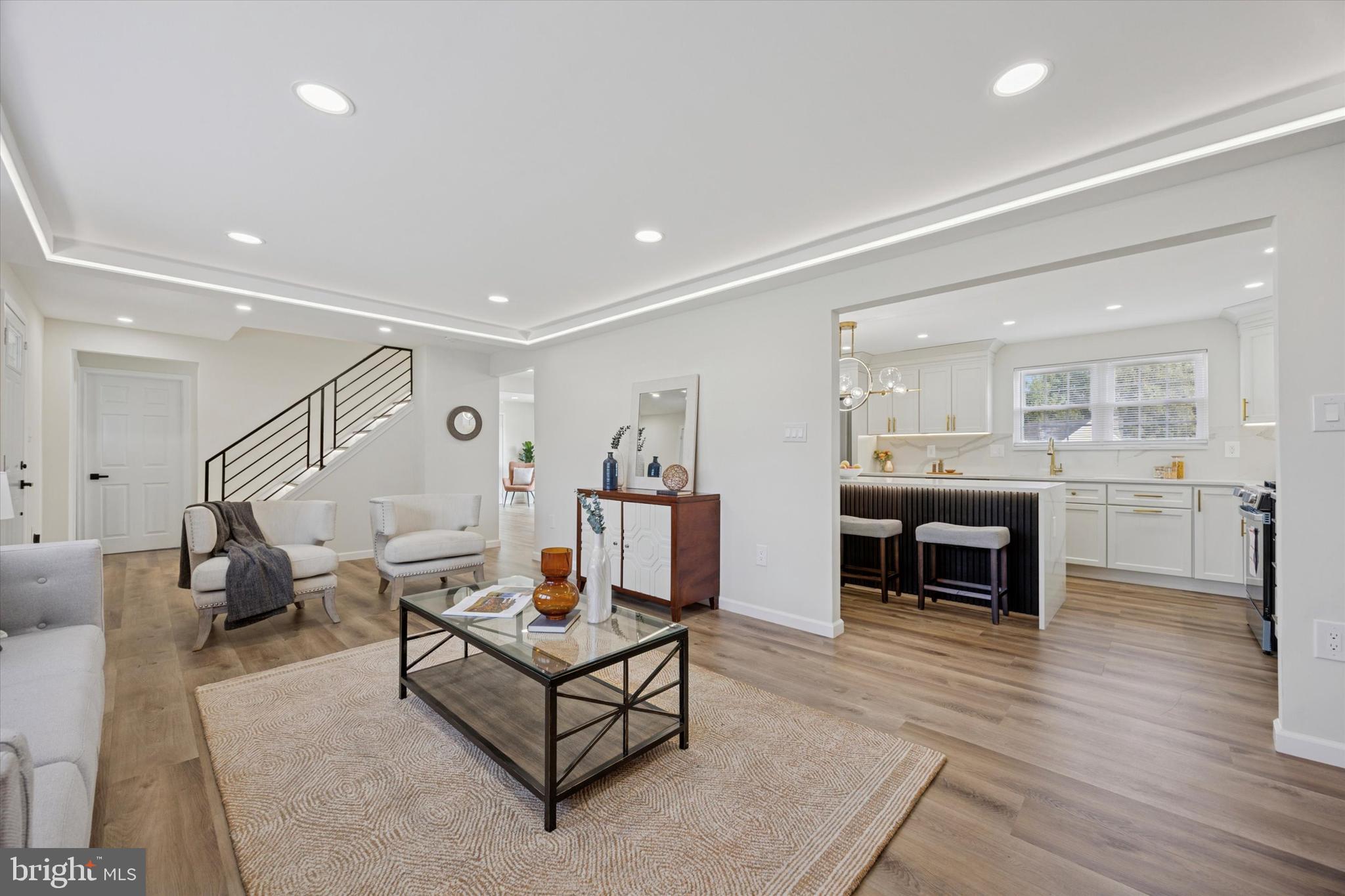 1574 Deer Run Road Warminster, PA 18974 - Photo 7 of 37 a living room with furniture and kitchen view