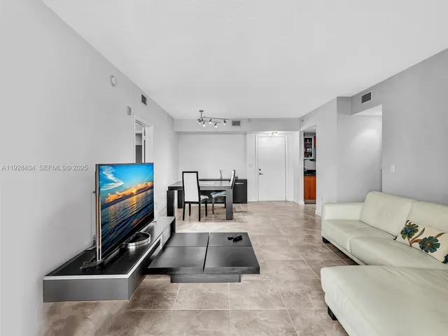 a bedroom with a bed and a walk in closet