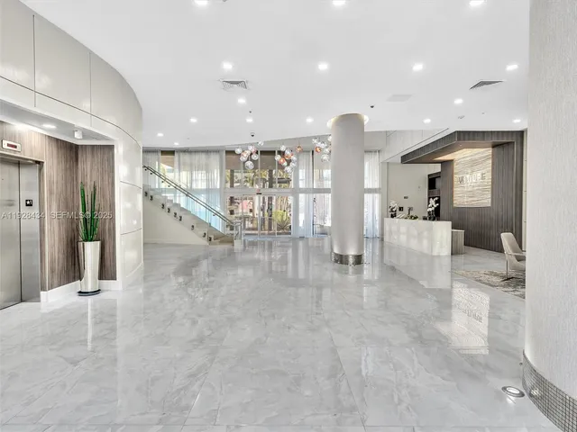 a view of a city with tall buildings