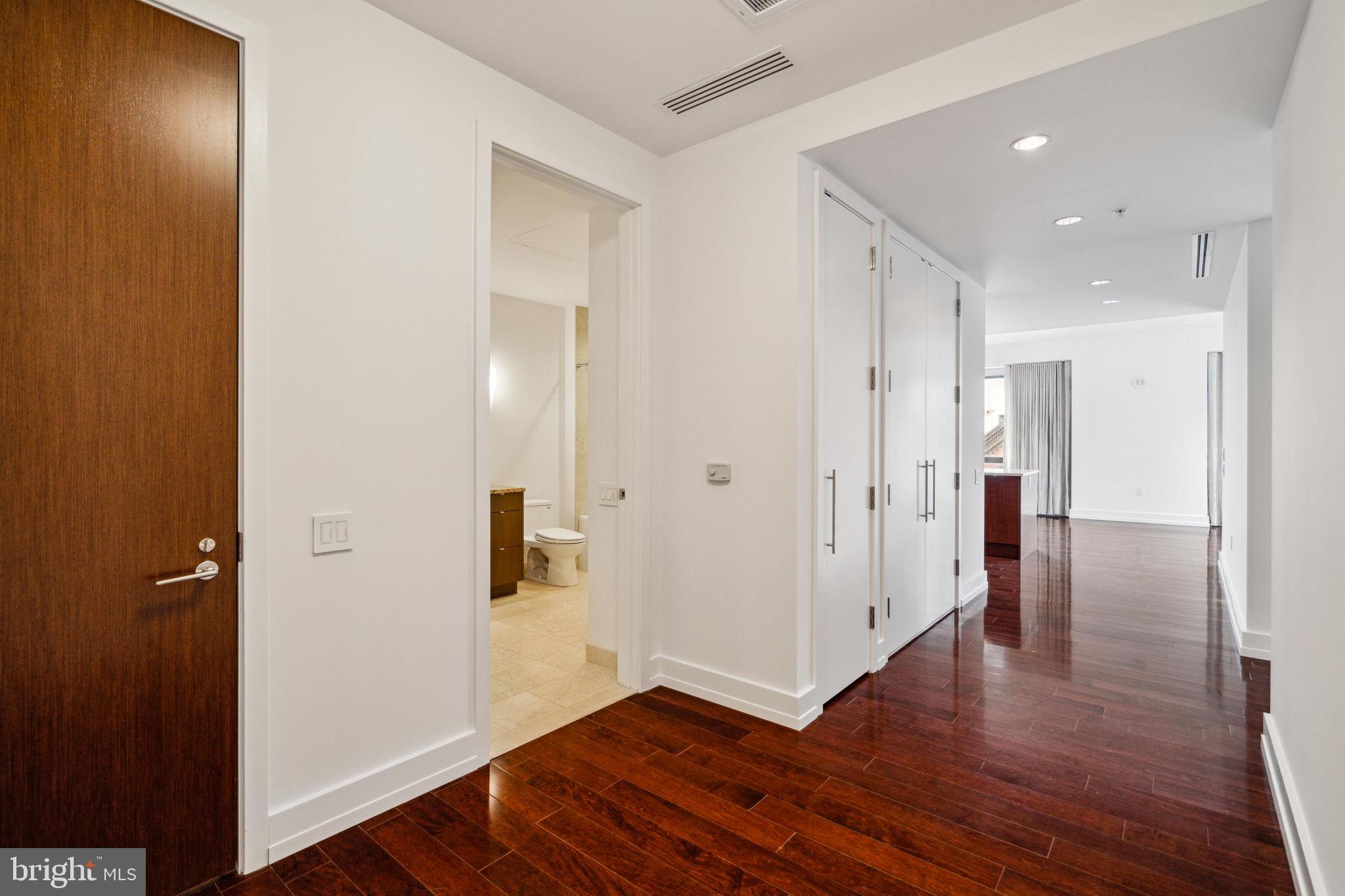 1706 Rittenhouse Square, Unit 402 Philadelphia, PA 19103 - Photo 4 of 27 wooden floor in an empty room with wooden floor