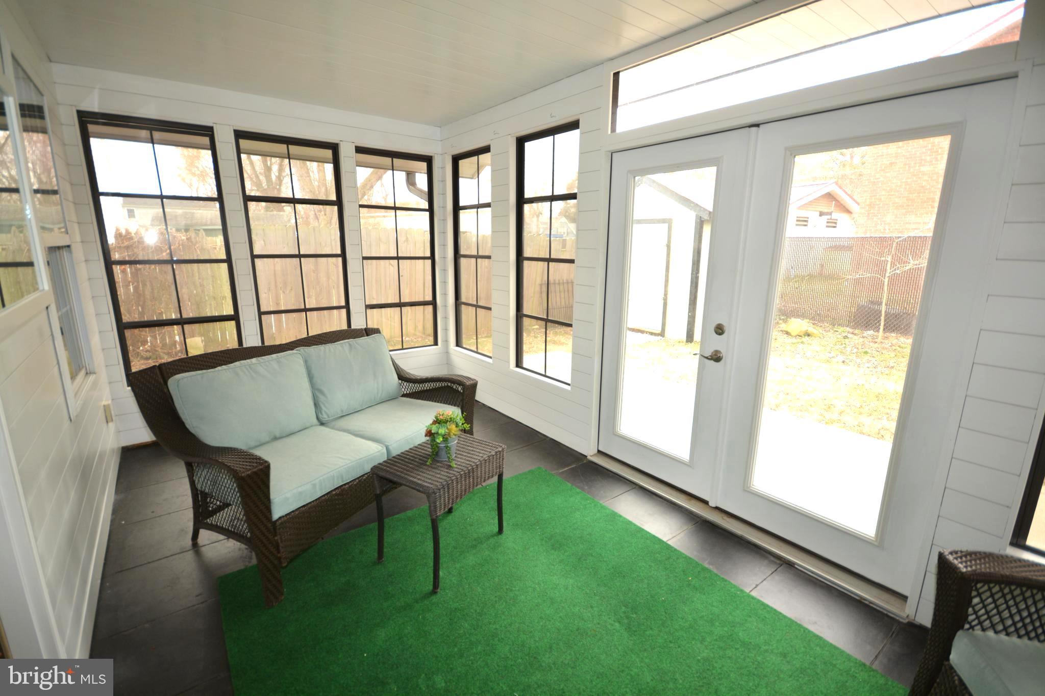 106 B Conner Street St. Michaels, MD 21663 - Photo 17 of 27 a living room with furniture and a window