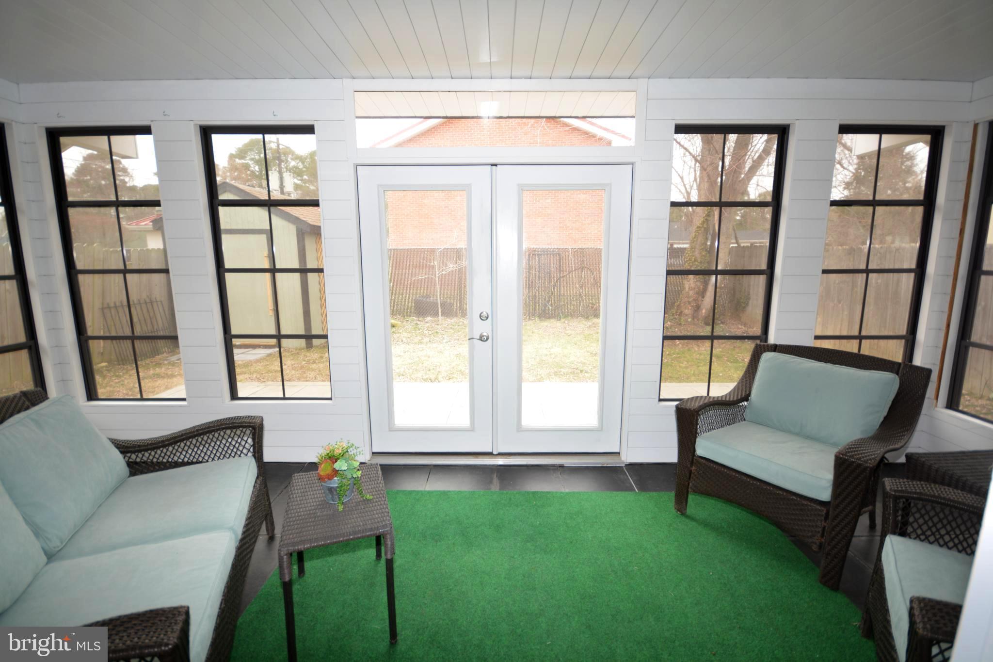 106 B Conner Street St. Michaels, MD 21663 - Photo 18 of 27 a living room with furniture and a window