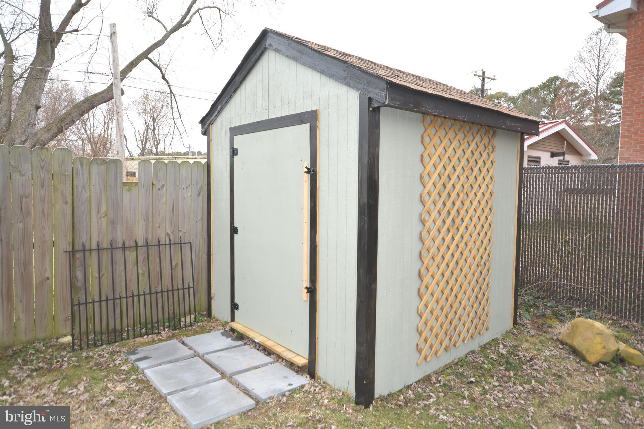 106 B Conner Street St. Michaels, MD 21663 - Photo 26 of 27 a view of a house with a wooden fence