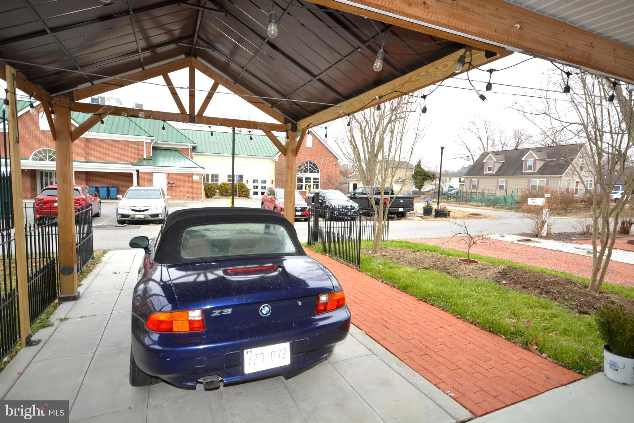106 B Conner Street St. Michaels, MD 21663 - Photo 27 of 27 a car parked on the side of the road