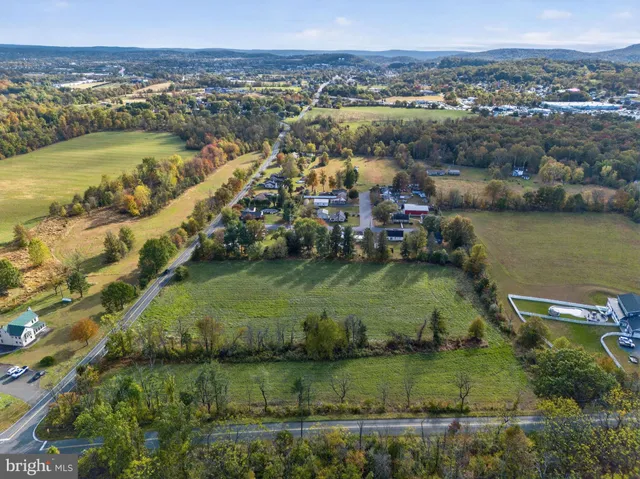 a view of a city with a lake