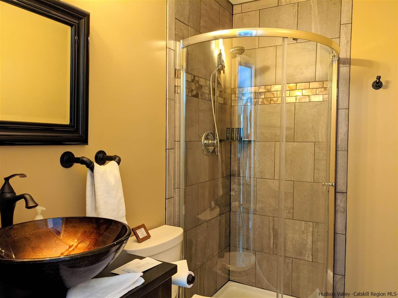 430 North Riverside Road Highland, NY 12528 - Photo 12 of 34 a bathroom with a shower