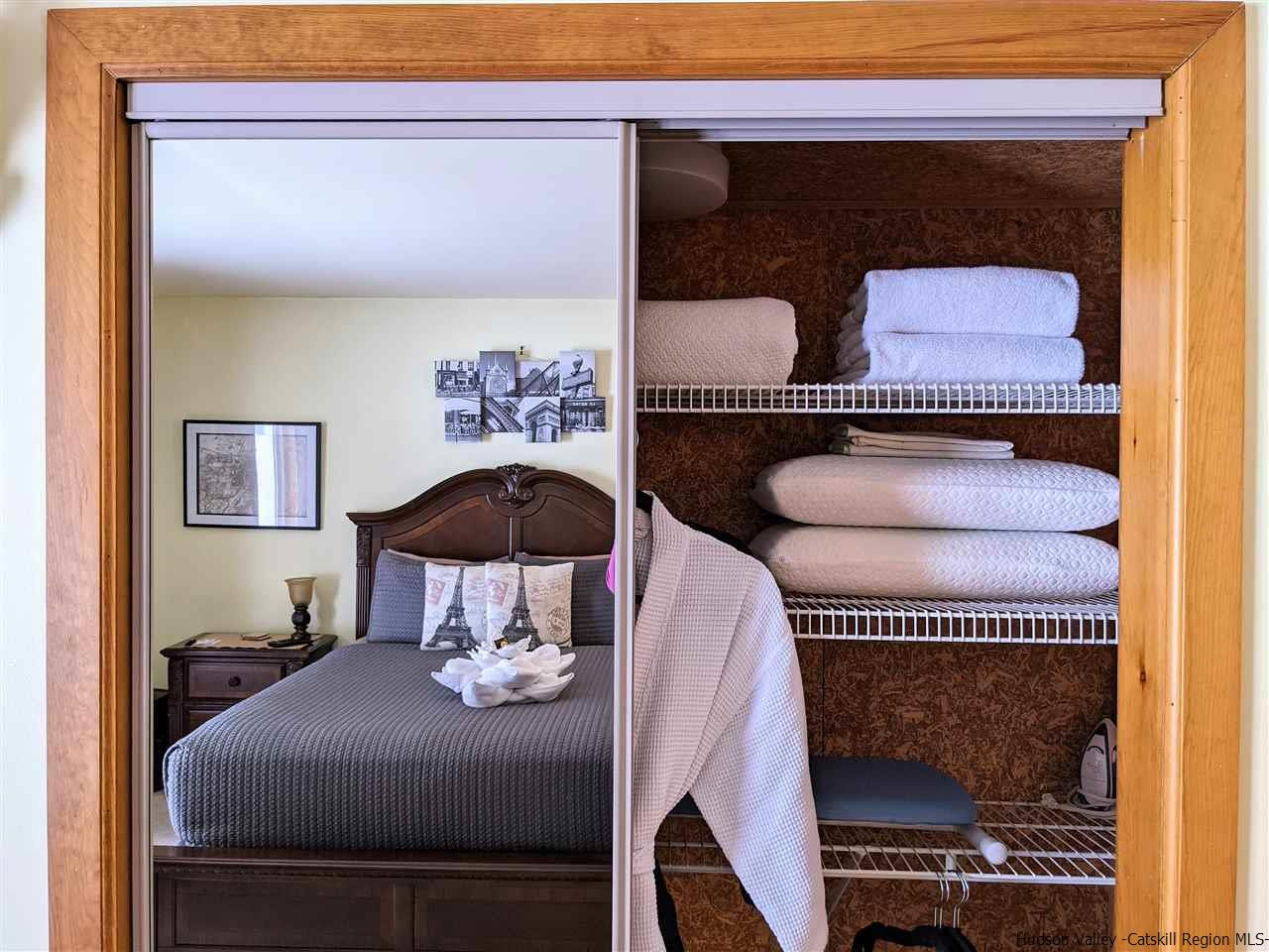 430 North Riverside Road Highland, NY 12528 - Photo 20 of 34 a living room with furniture and a lamp