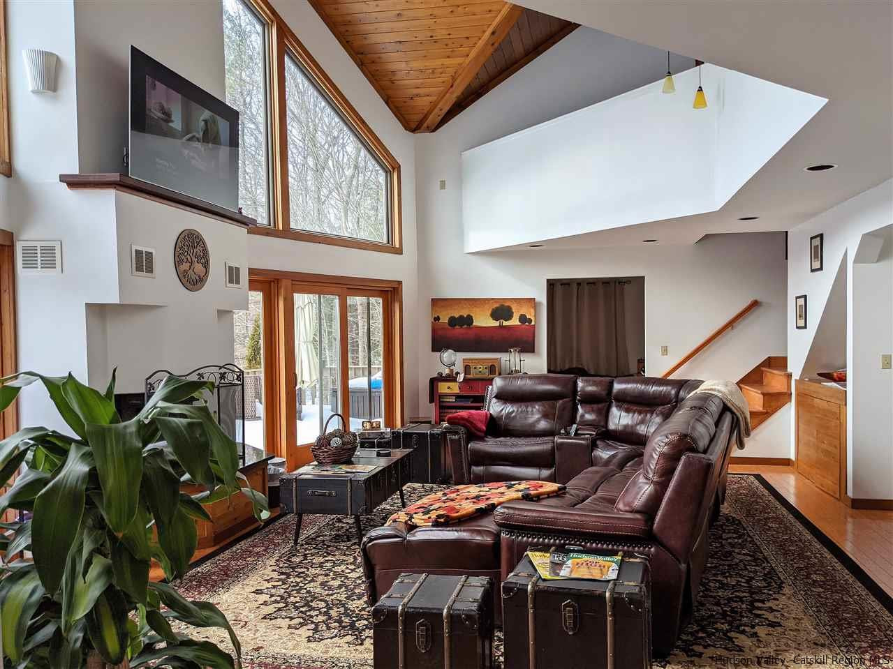 430 North Riverside Road Highland, NY 12528 - Photo 21 of 34 a living room with furniture and wooden floor