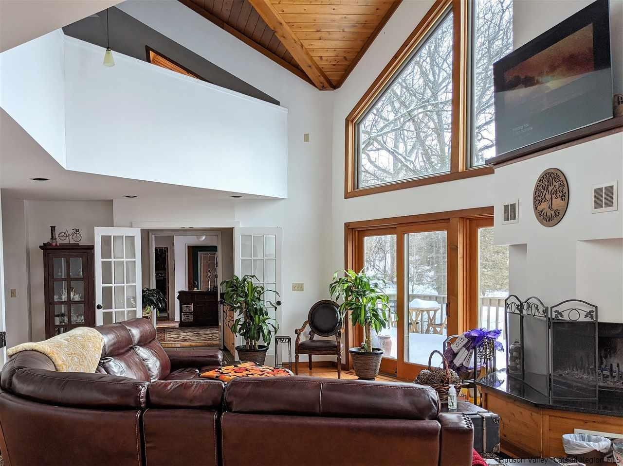 430 North Riverside Road Highland, NY 12528 - Photo 22 of 34 a living room with furniture and a large window