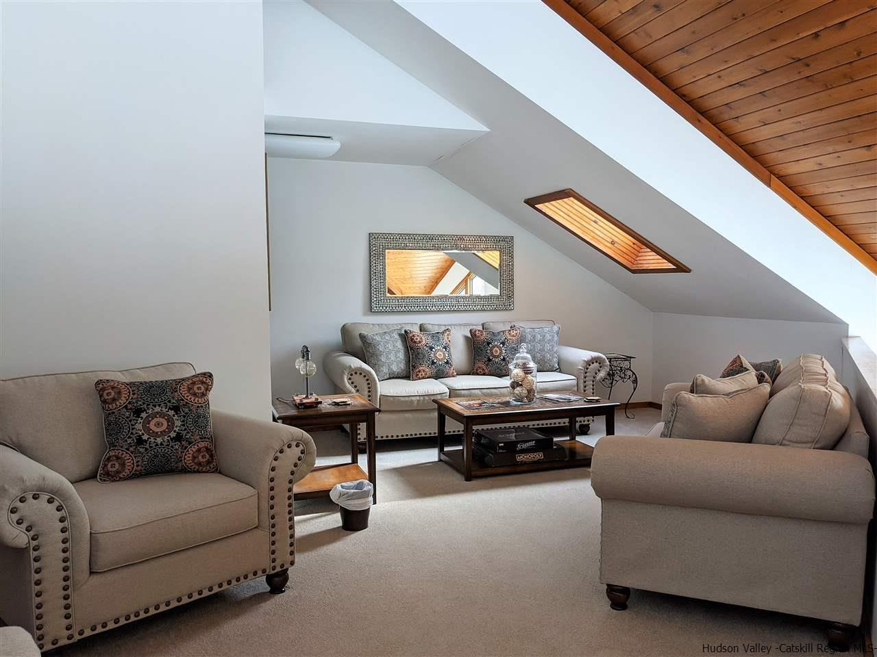 430 North Riverside Road Highland, NY 12528 - Photo 25 of 34 a living room with furniture and a couch