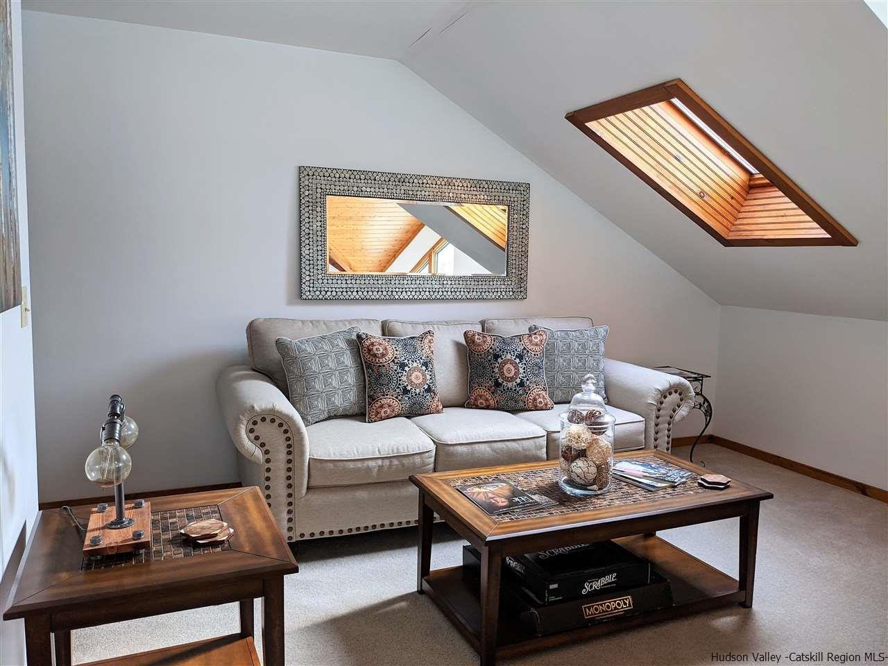430 North Riverside Road Highland, NY 12528 - Photo 26 of 34 a living room with furniture and a wooden floor