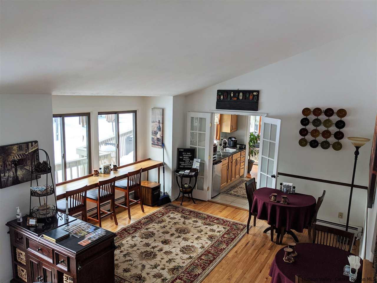 430 North Riverside Road Highland, NY 12528 - Photo 3 of 34 a living room with furniture a rug and a window