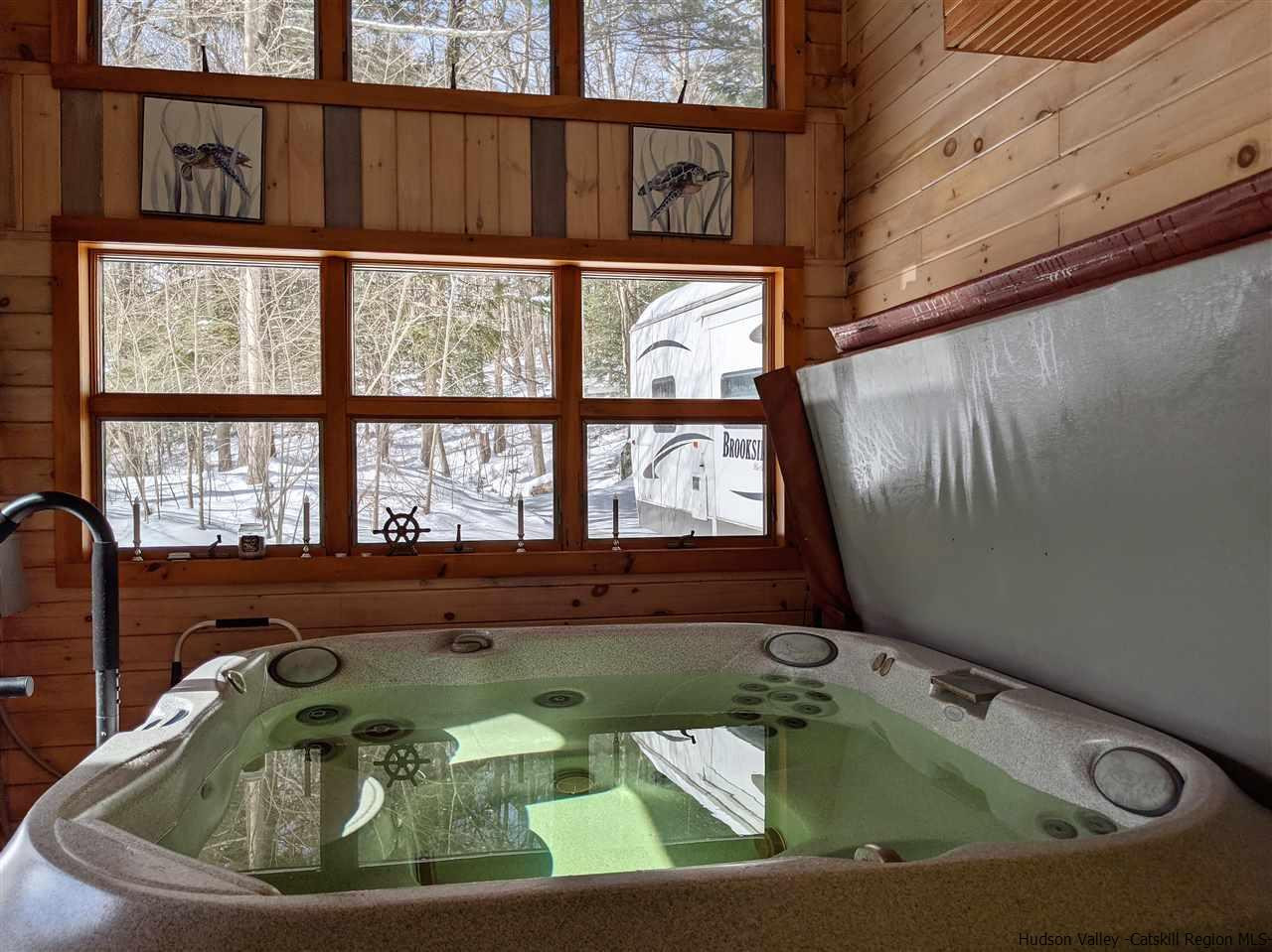 430 North Riverside Road Highland, NY 12528 - Photo 33 of 34 a bathroom with a bathtub and window