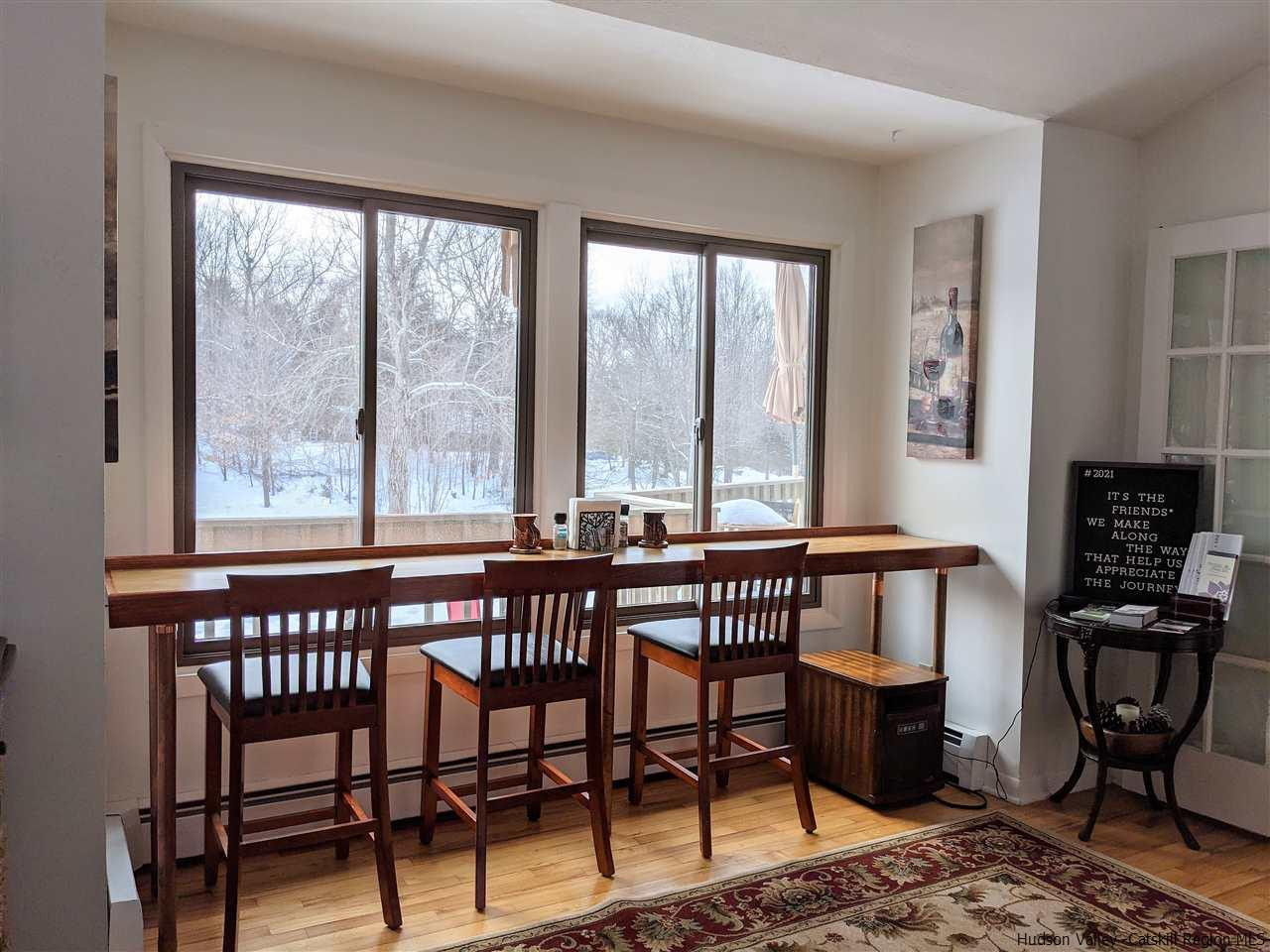 430 North Riverside Road Highland, NY 12528 - Photo 4 of 34 a view of a dining room with furniture window and outside view