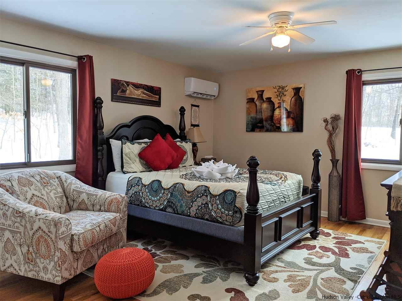 430 North Riverside Road Highland, NY 12528 - Photo 8 of 34 a bedroom with furniture and windows