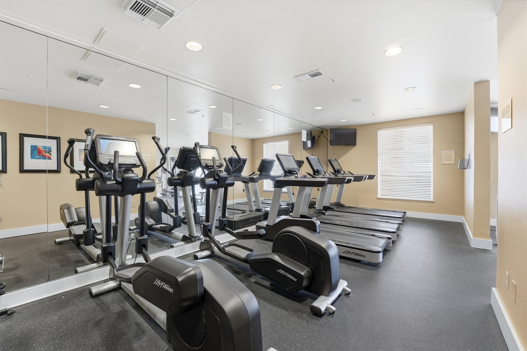 3505 Sage Road, Unit 208 Houston, TX 77056 - Photo 16 of 25 a view of a room with gym equipment