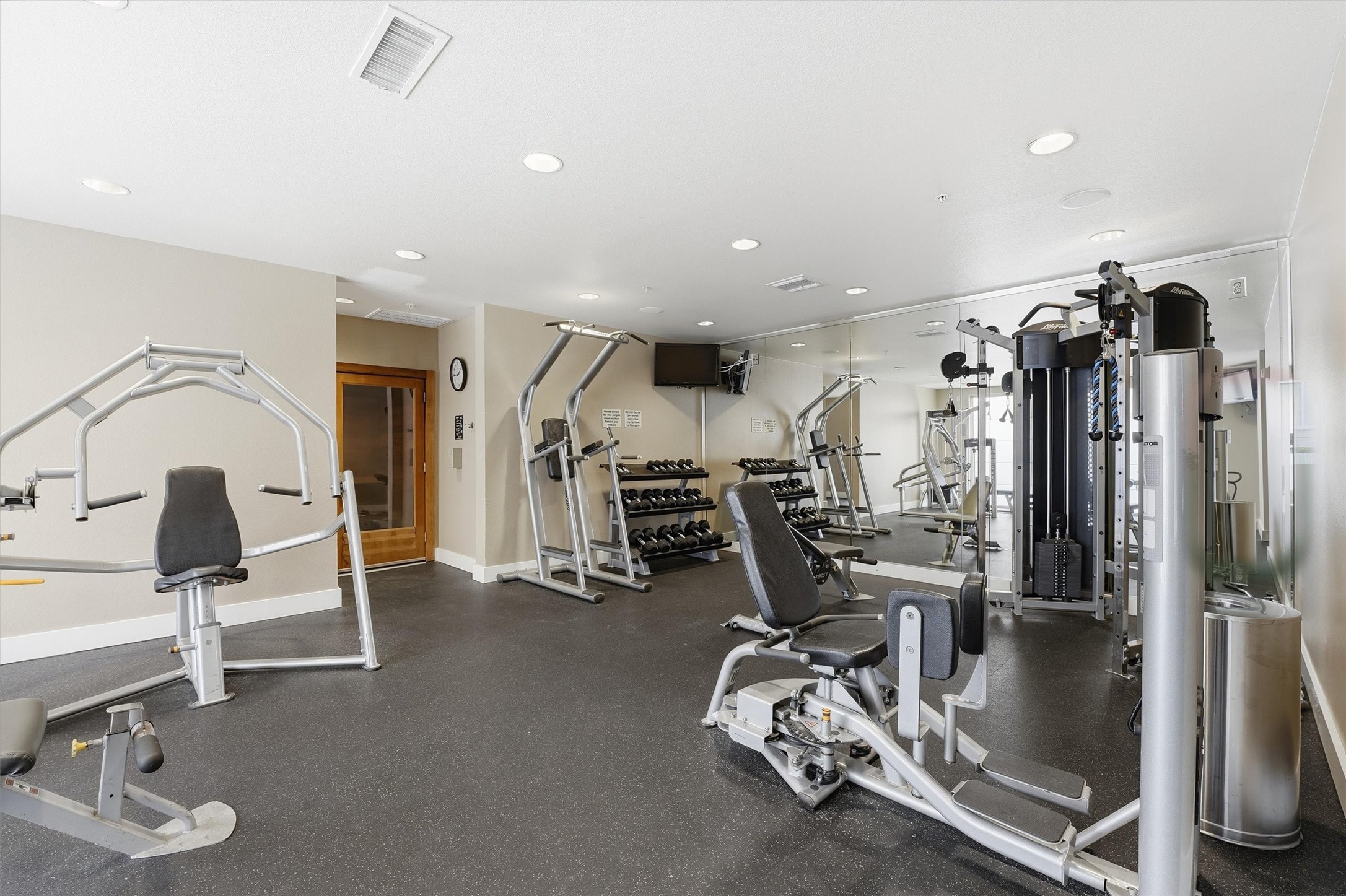 3505 Sage Road, Unit 208 Houston, TX 77056 - Photo 17 of 25 a view of a room with gym equipment