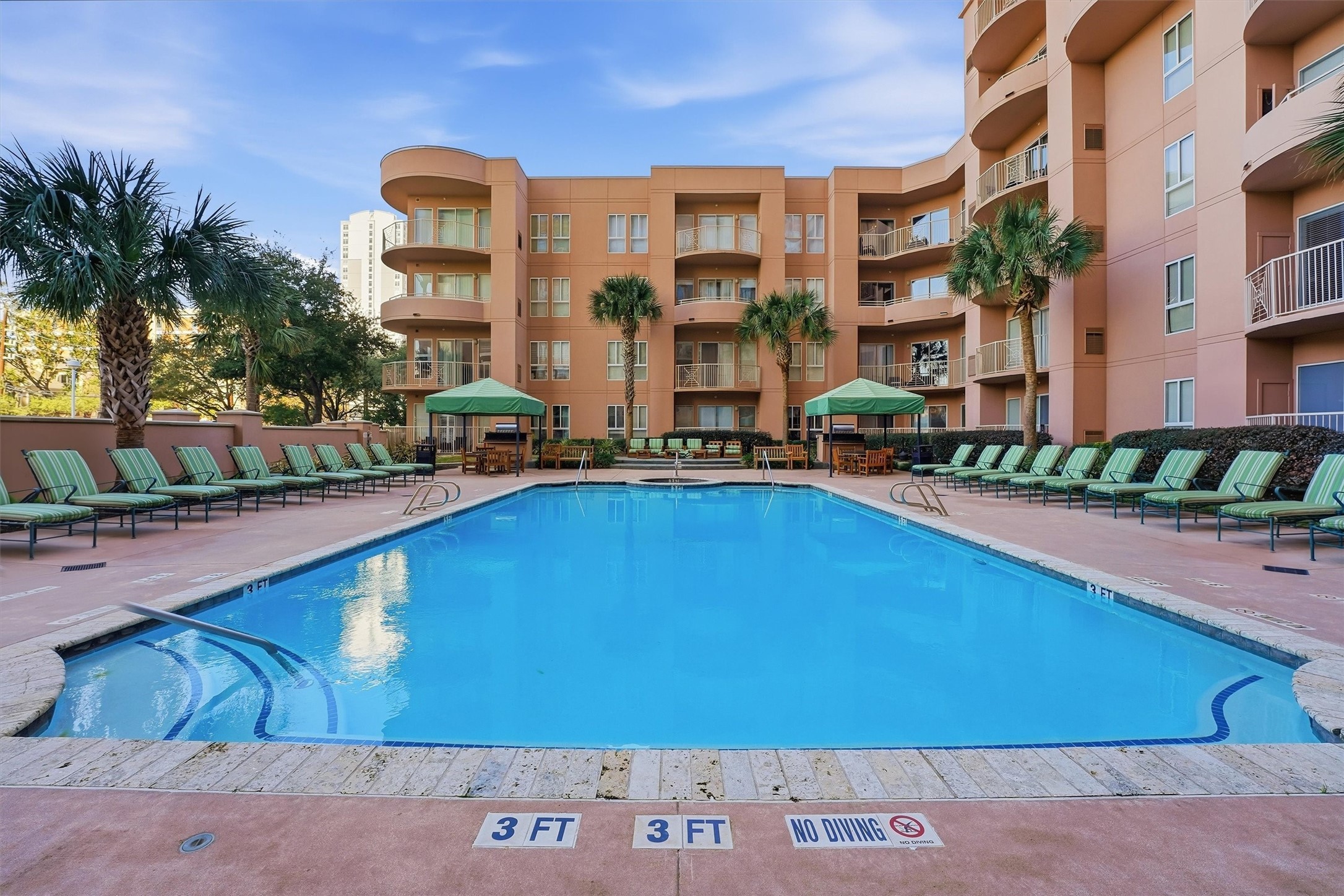 3505 Sage Road, Unit 208 Houston, TX 77056 - Photo 19 of 25 a view of swimming pool with outdoor seating