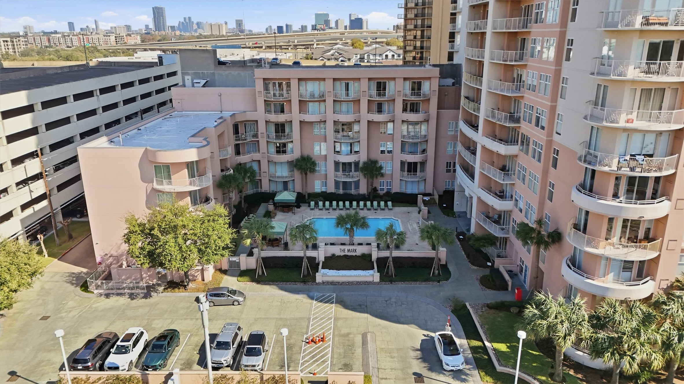 3505 Sage Road, Unit 208 Houston, TX 77056 - Photo 21 of 25 a picture of a building with outdoor seating