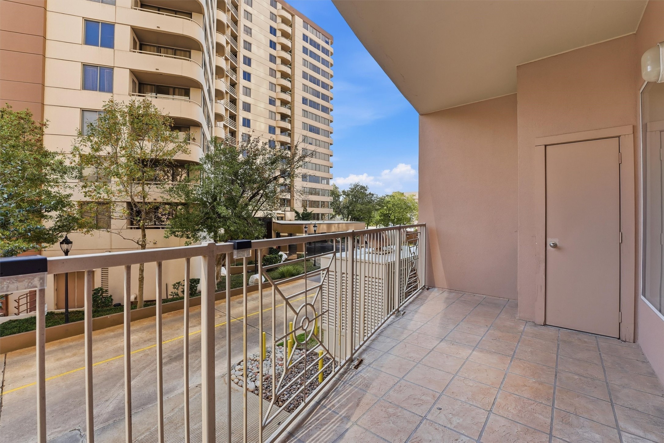3505 Sage Road, Unit 208 Houston, TX 77056 - Photo 23 of 25 a view of a balcony with wooden floor