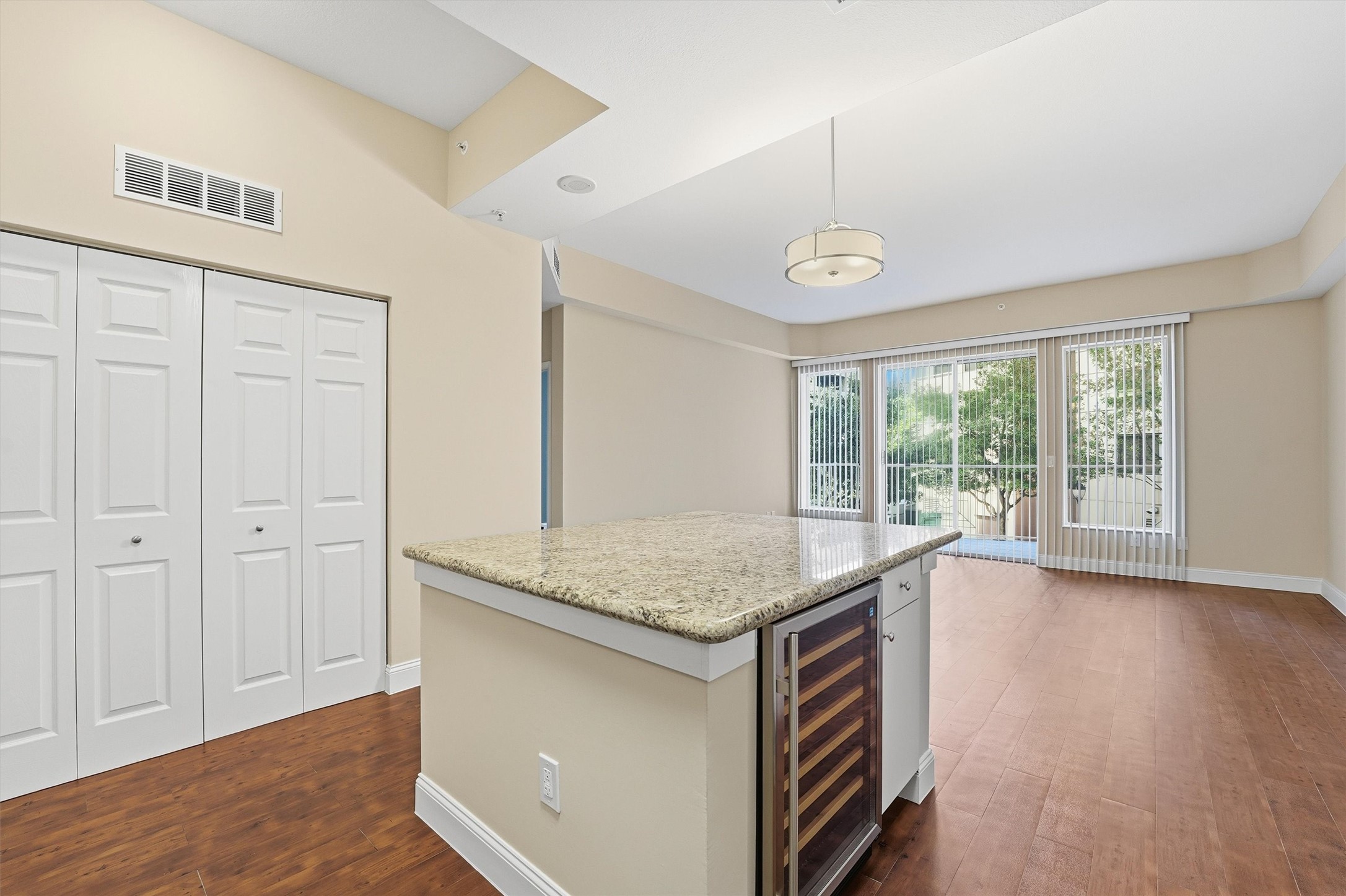 3505 Sage Road, Unit 208 Houston, TX 77056 - Photo 4 of 25 wooden floor in an empty room with a window