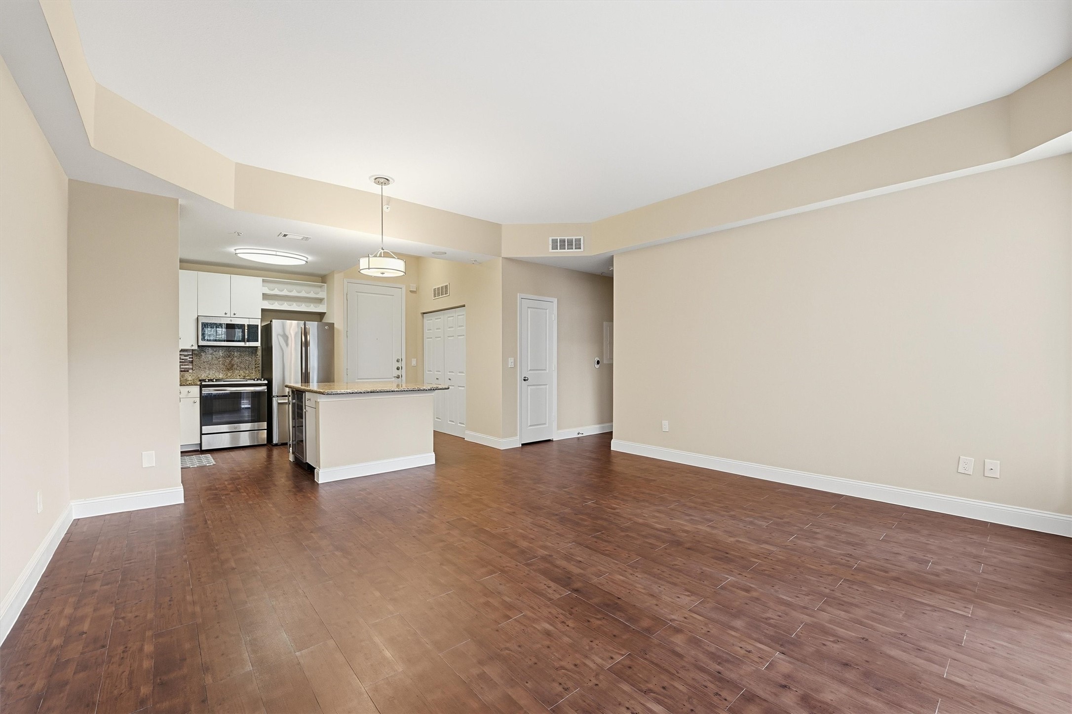 3505 Sage Road, Unit 208 Houston, TX 77056 - Photo 6 of 25 a view of an empty room with wooden floor