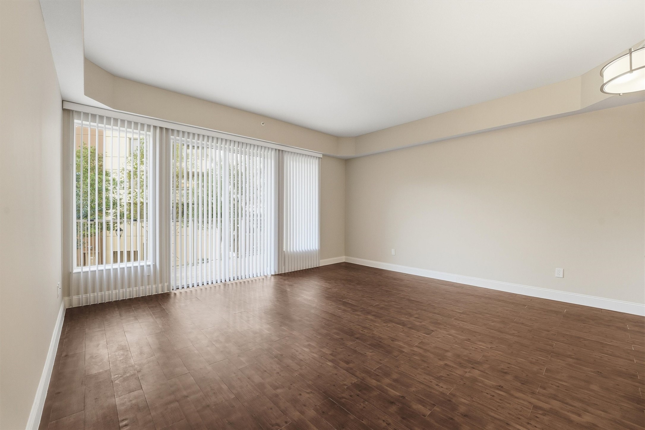 3505 Sage Road, Unit 208 Houston, TX 77056 - Photo 7 of 25 a view of an empty room with wooden floor and a window