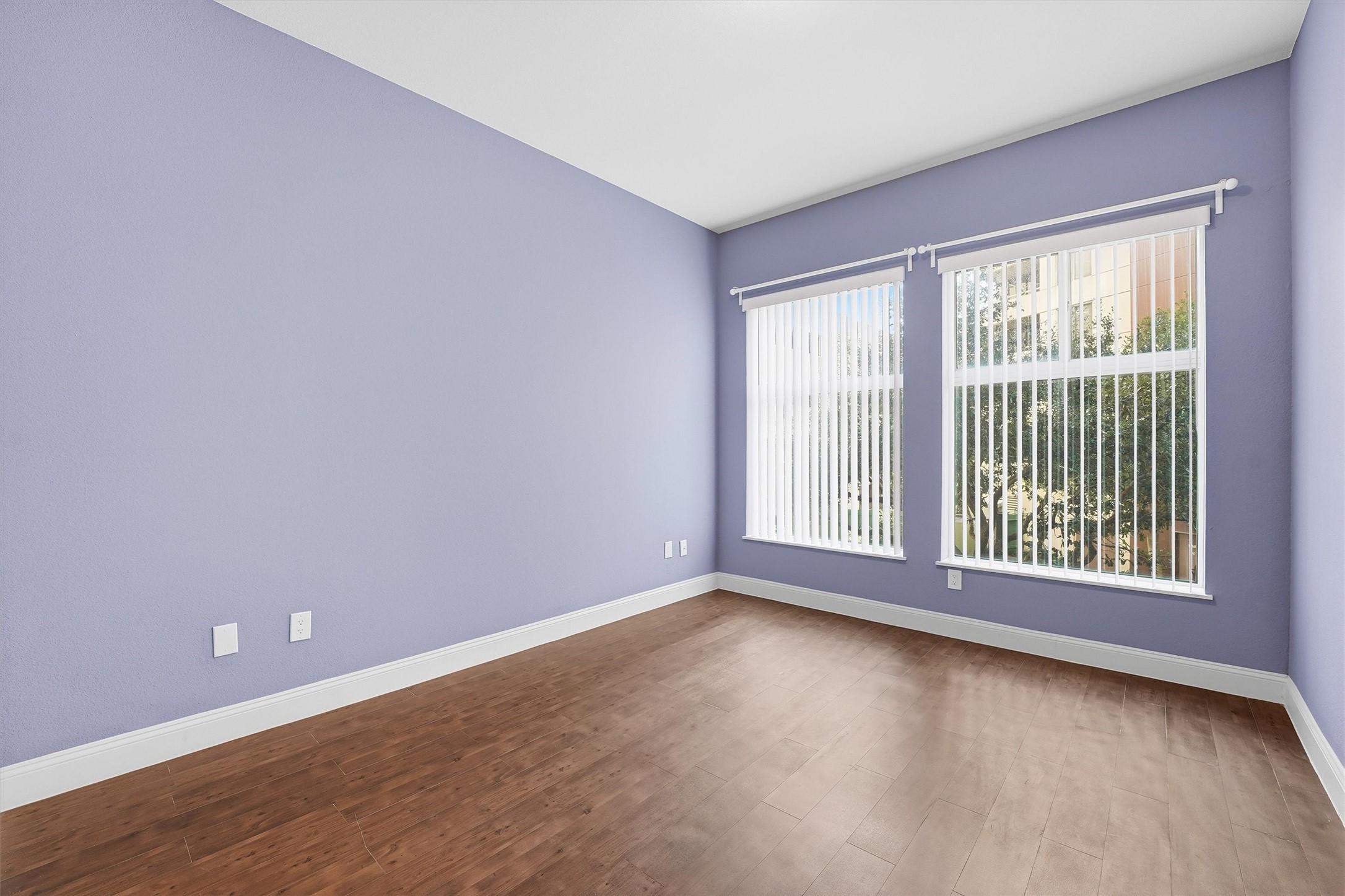 3505 Sage Road, Unit 208 Houston, TX 77056 - Photo 8 of 25 a view of an empty room with wooden floor and a window