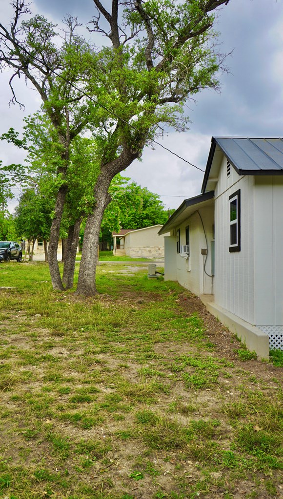 110 4th Street Ingram, TX 78025 - Photo 15 of 15 a house view with a garden space