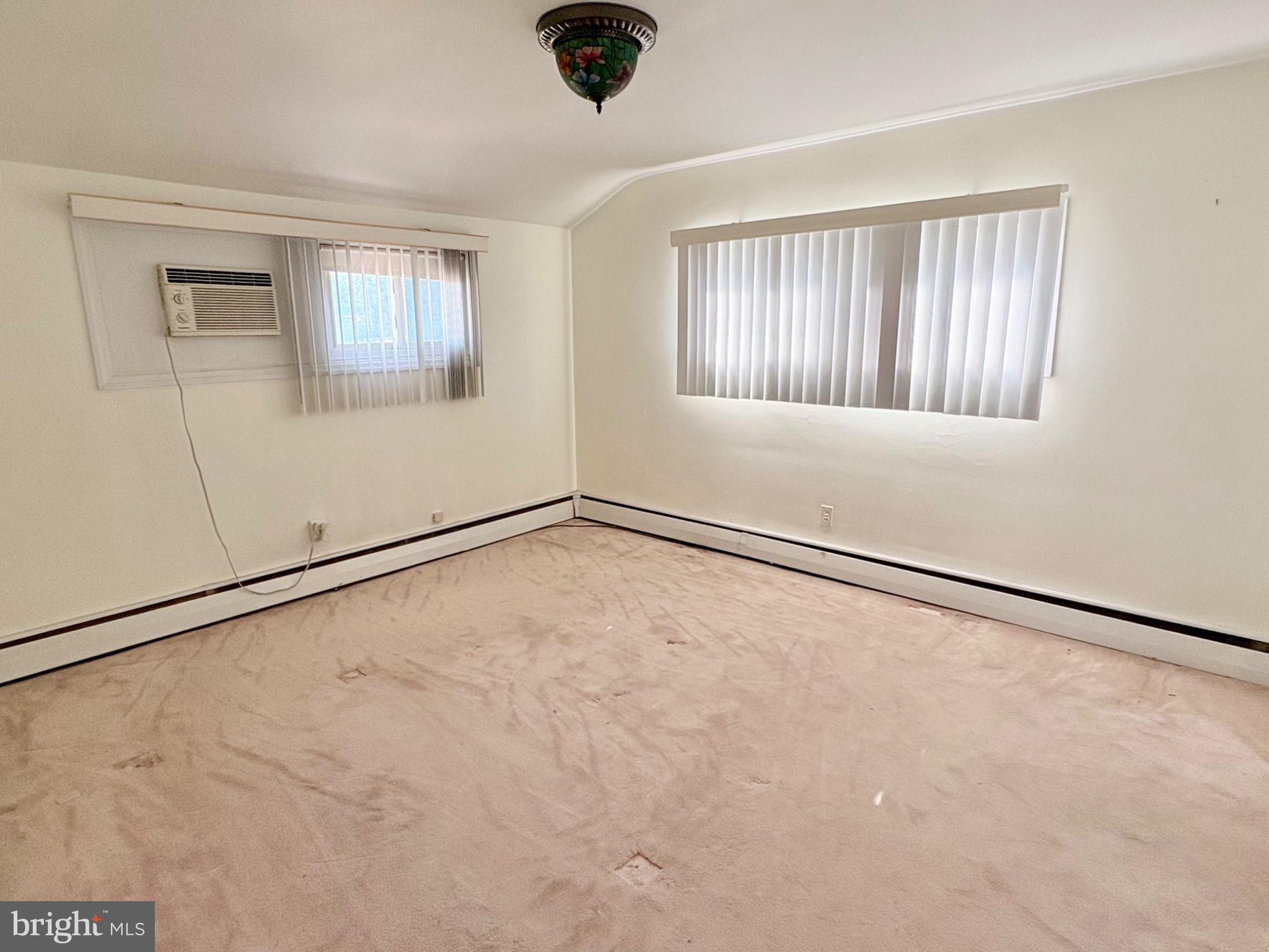 155 Locust Avenue Hamilton, NJ 08610 - Photo 16 of 25 a view of an empty room with a window