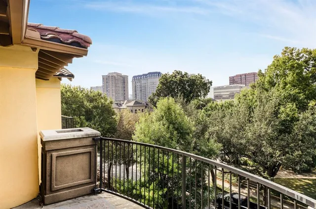 a view of a balcony with an outdoor space