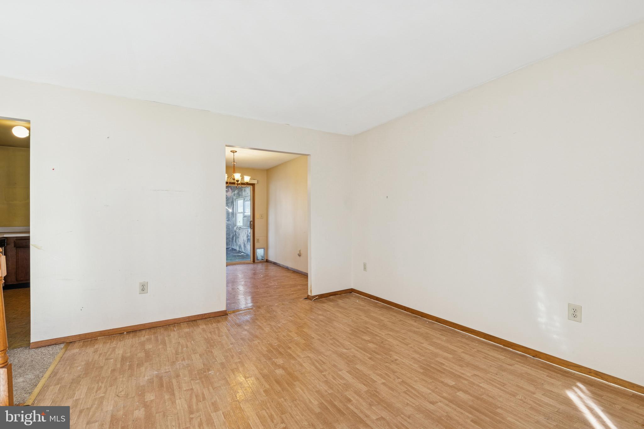 7518 Harmans Road Harmans, MD 21077 - Photo 11 of 34 a view of an empty room and wooden floor