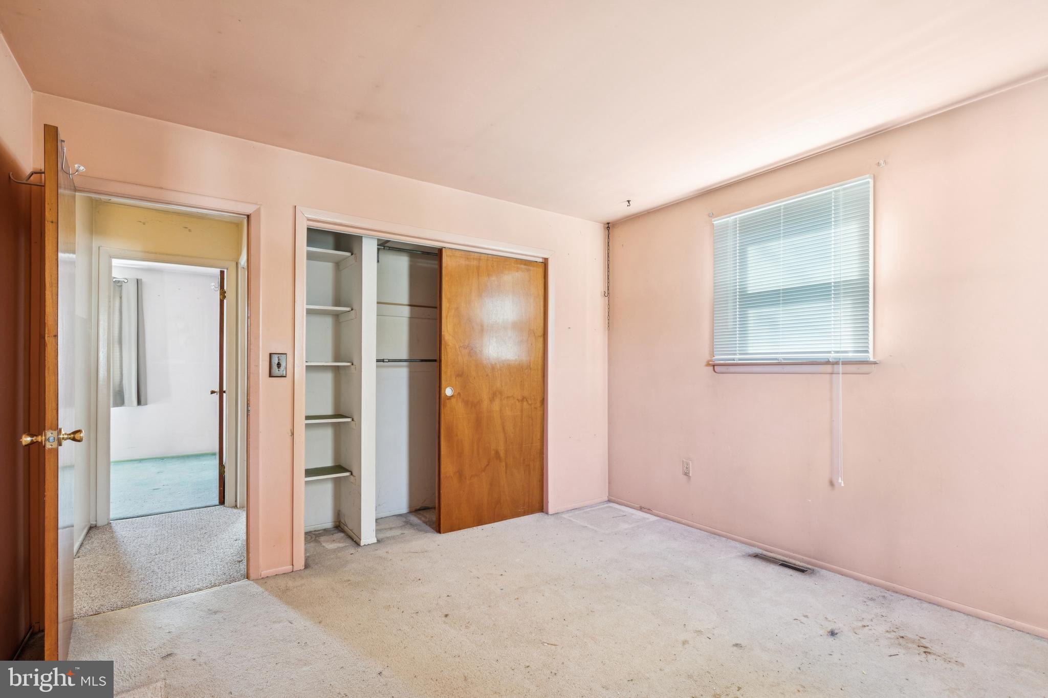 7518 Harmans Road Harmans, MD 21077 - Photo 17 of 34 an empty room with a bathroom and mirror
