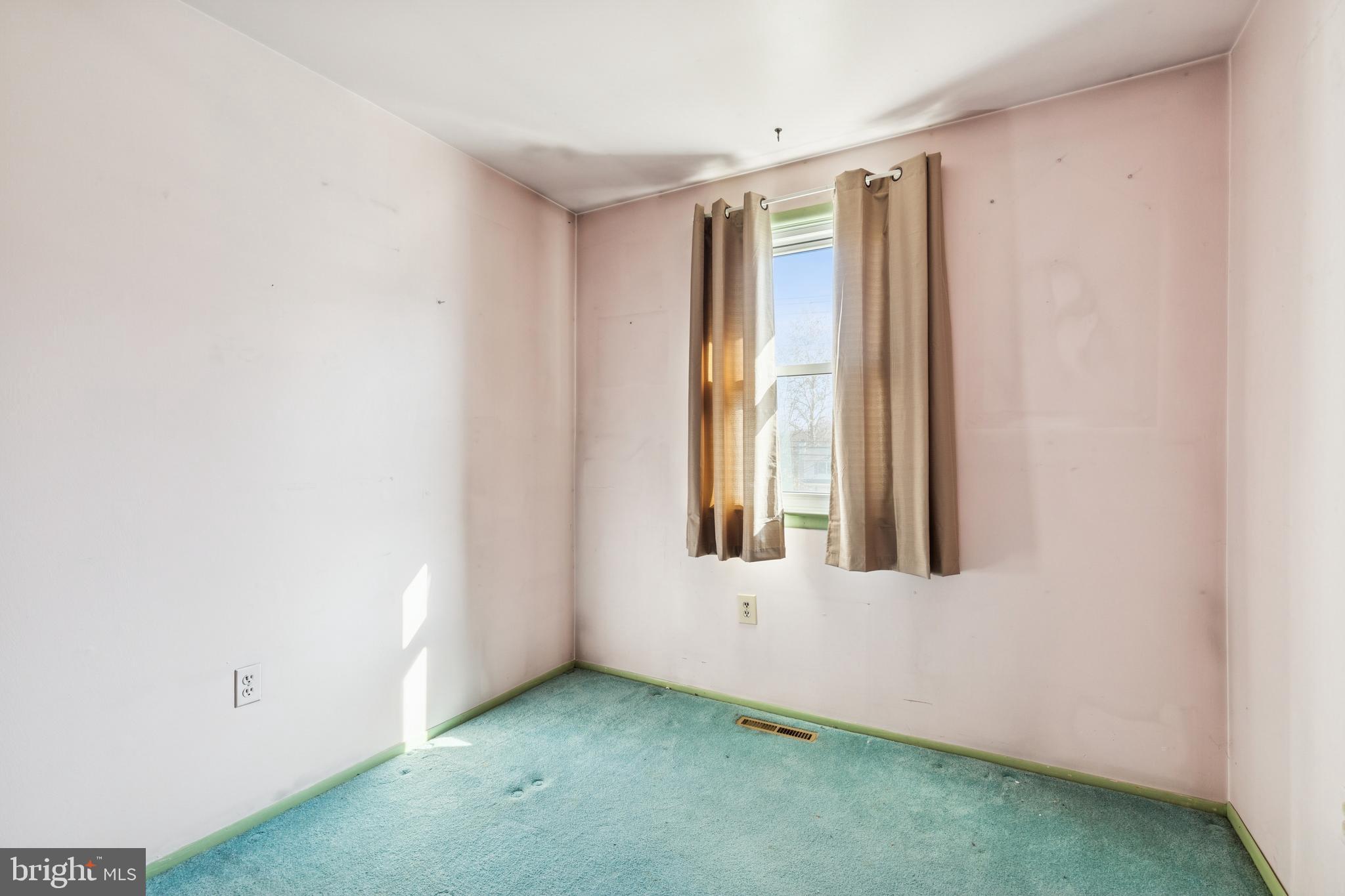 7518 Harmans Road Harmans, MD 21077 - Photo 19 of 34 an empty room with a window