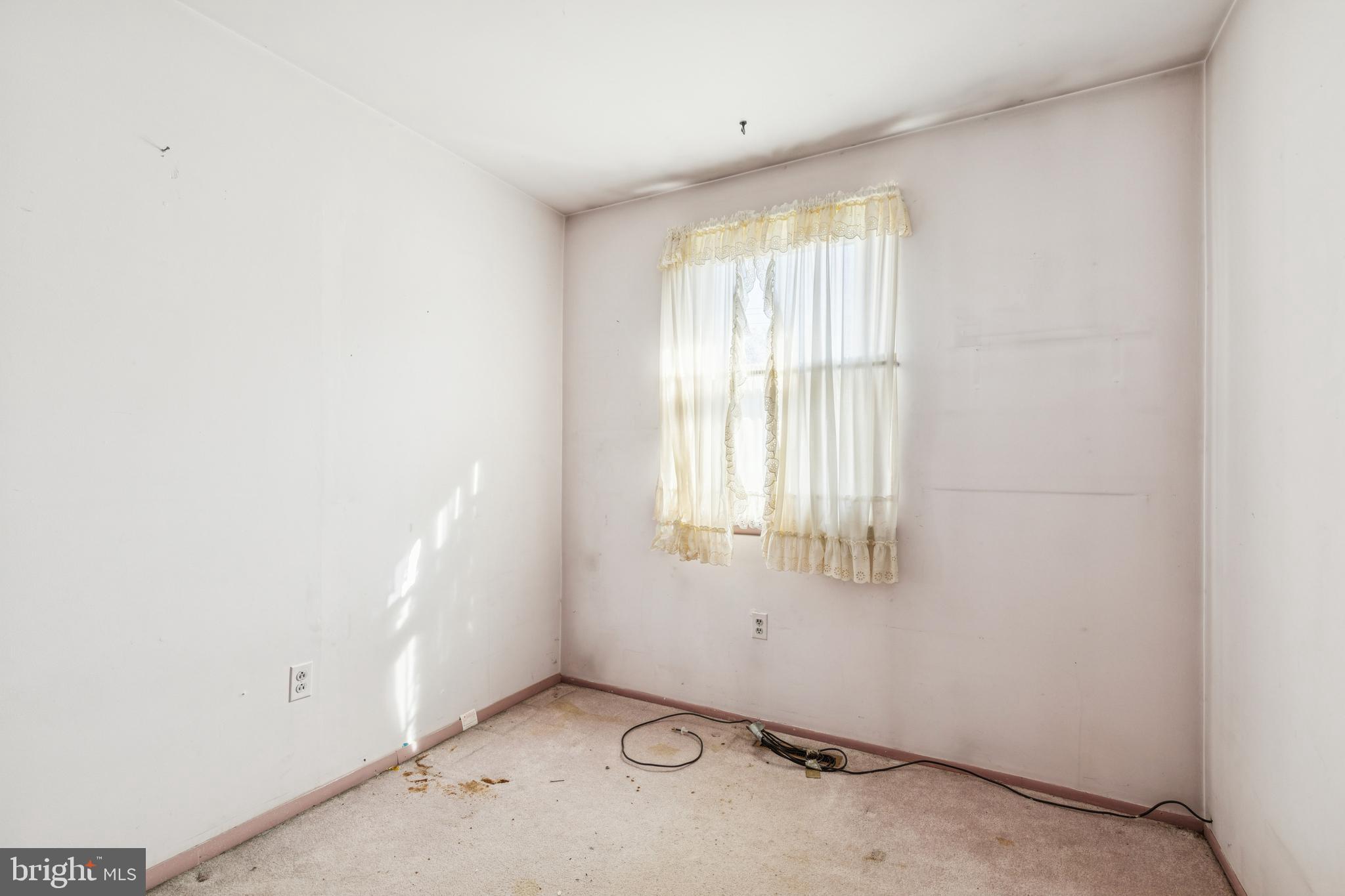 7518 Harmans Road Harmans, MD 21077 - Photo 22 of 34 an empty room with a window