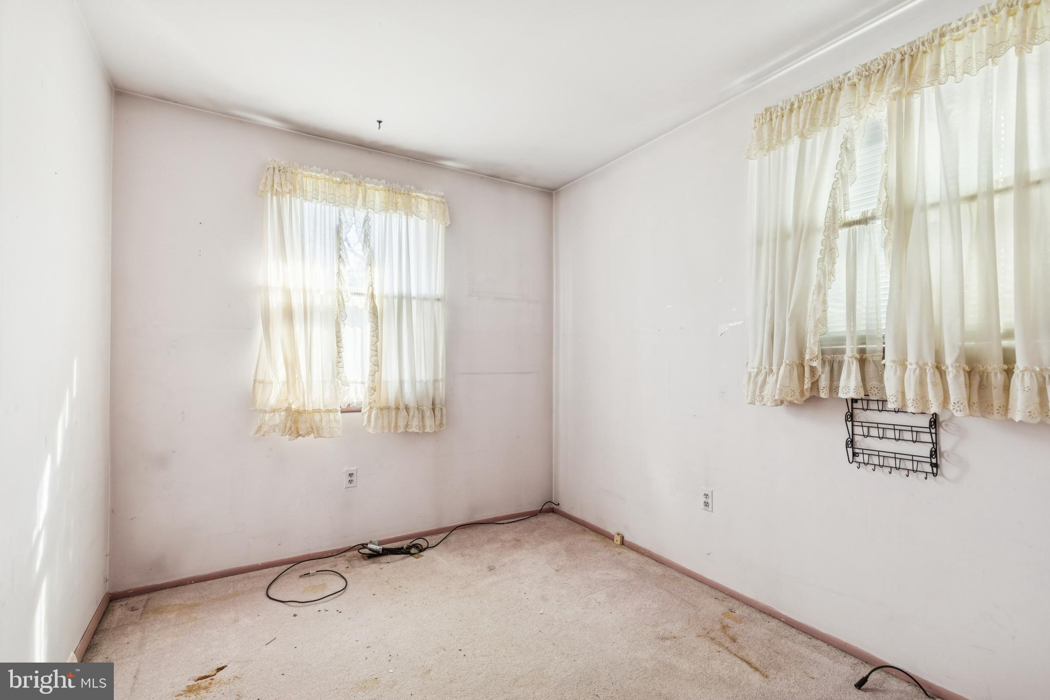 7518 Harmans Road Harmans, MD 21077 - Photo 24 of 34 an empty room with windows