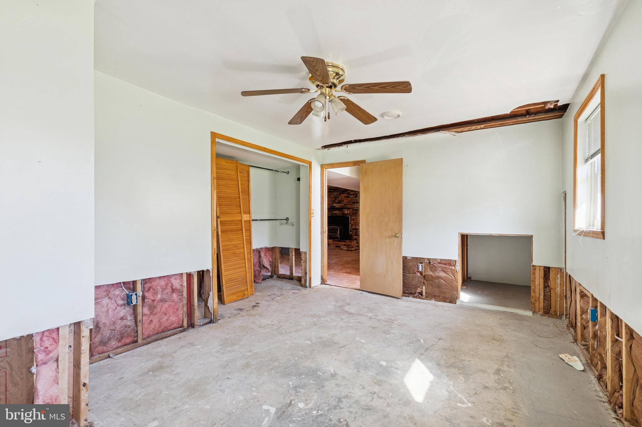 7518 Harmans Road Harmans, MD 21077 - Photo 26 of 34 a view of a livingroom with a ceiling fan and entryway