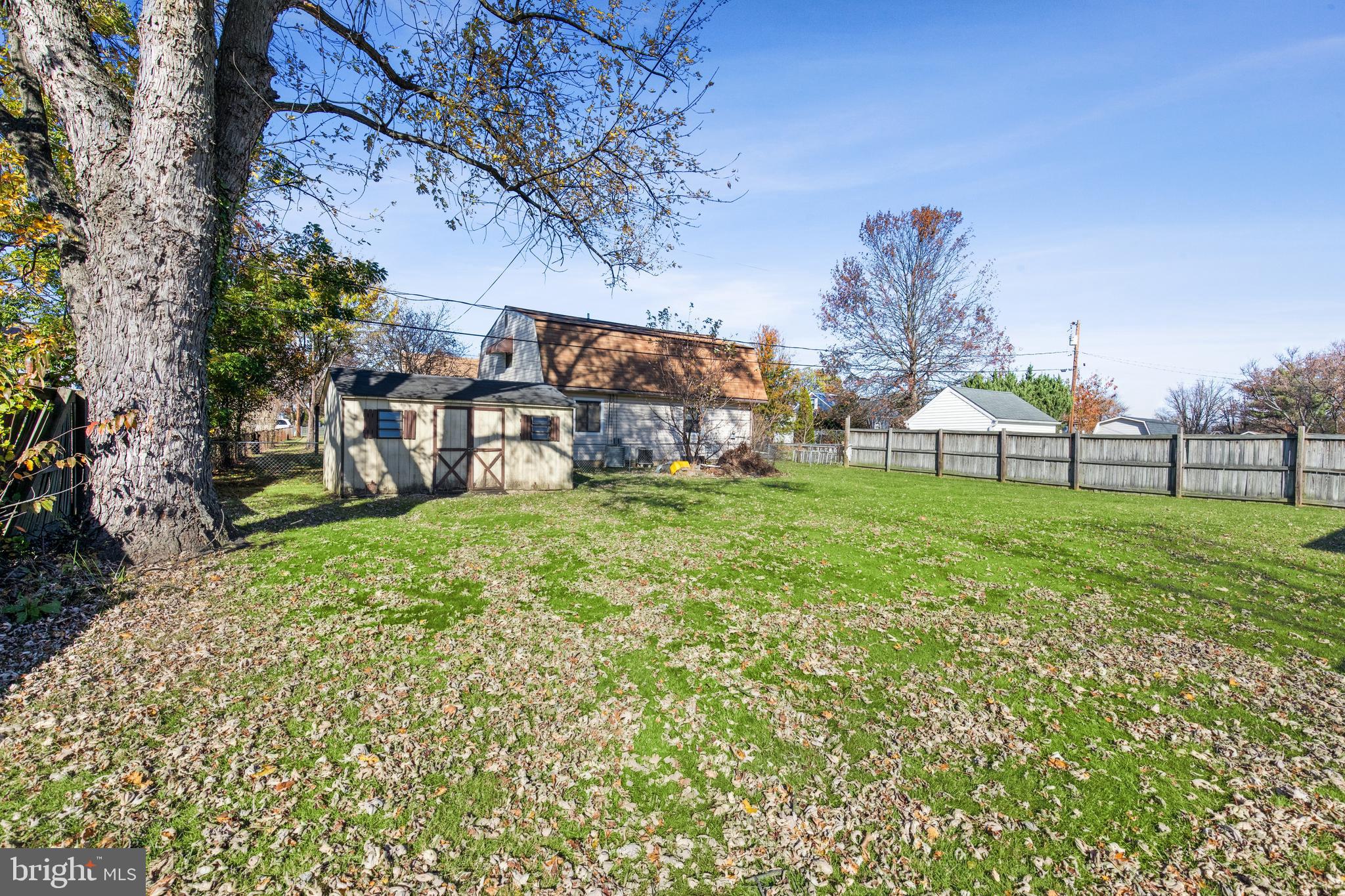 7518 Harmans Road Harmans, MD 21077 - Photo 29 of 34 a view of a house with a yard