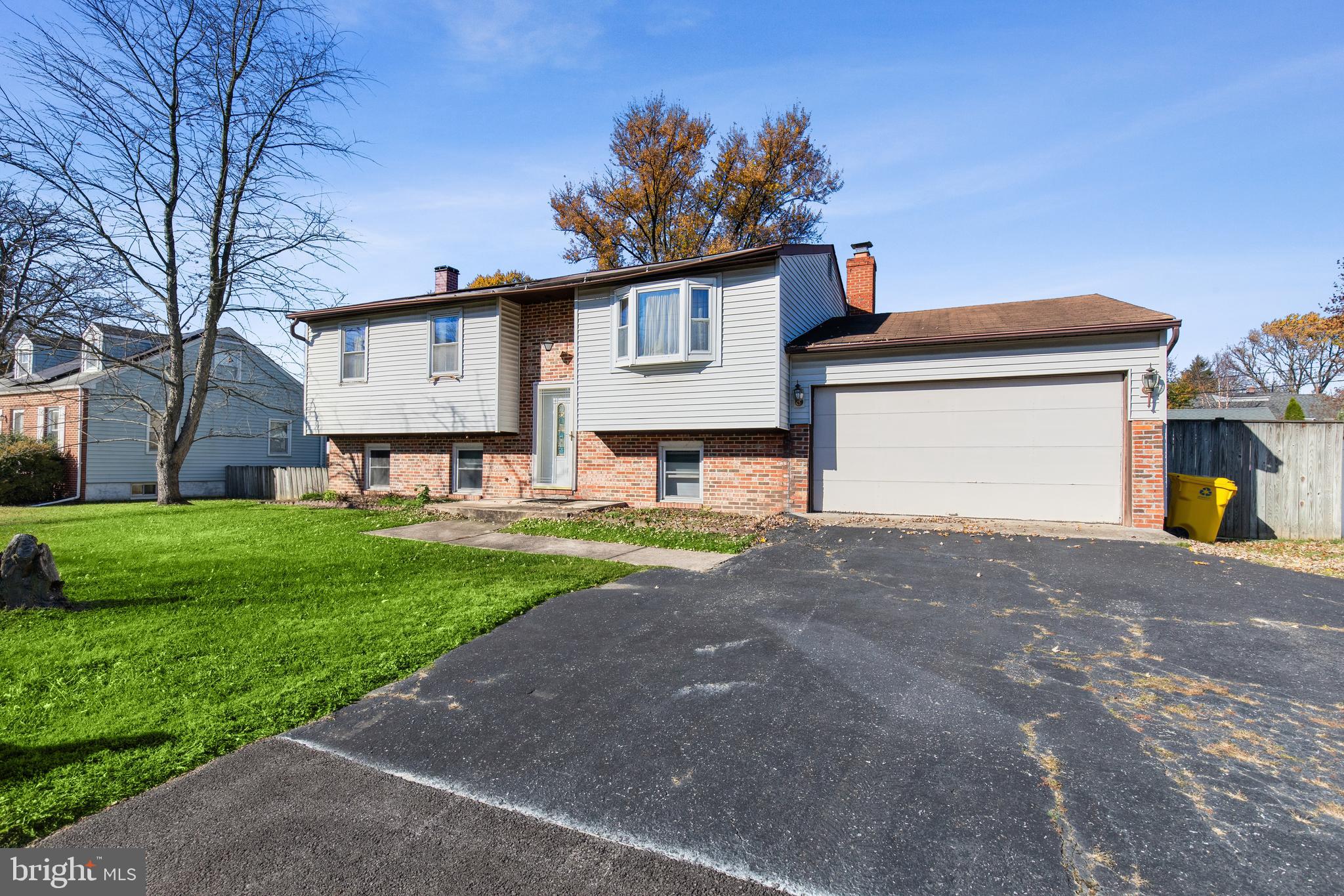 7518 Harmans Road Harmans, MD 21077 - Photo 30 of 34 a front view of a house with garden