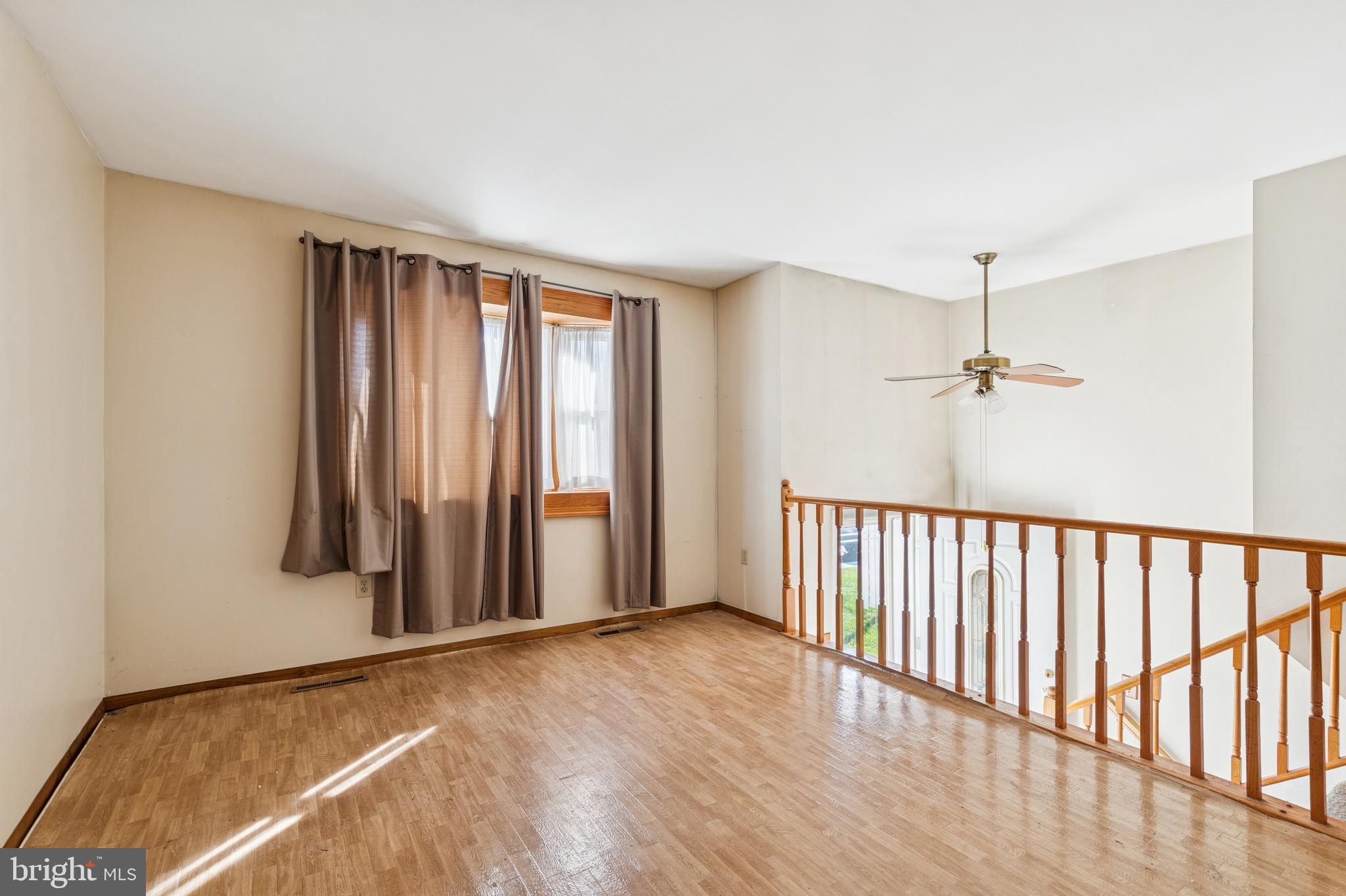 7518 Harmans Road Harmans, MD 21077 - Photo 9 of 34 a view of a room with wooden floor