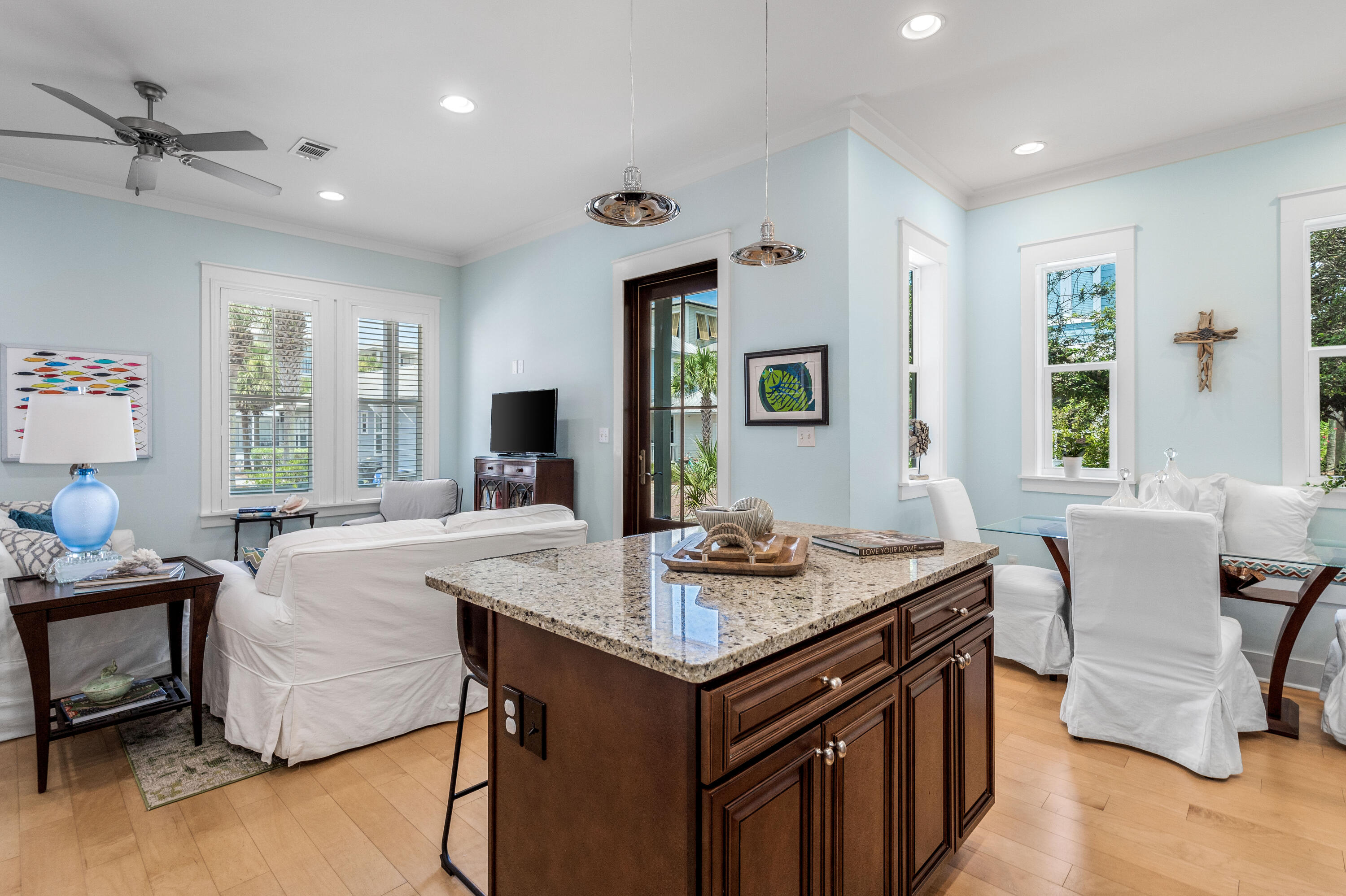 36 Moonlight Beach Lane Inlet Beach, FL 32461 - Photo 11 of 42 a view of kitchen island stainless steel appliances granite countertop furniture wooden floor and a window