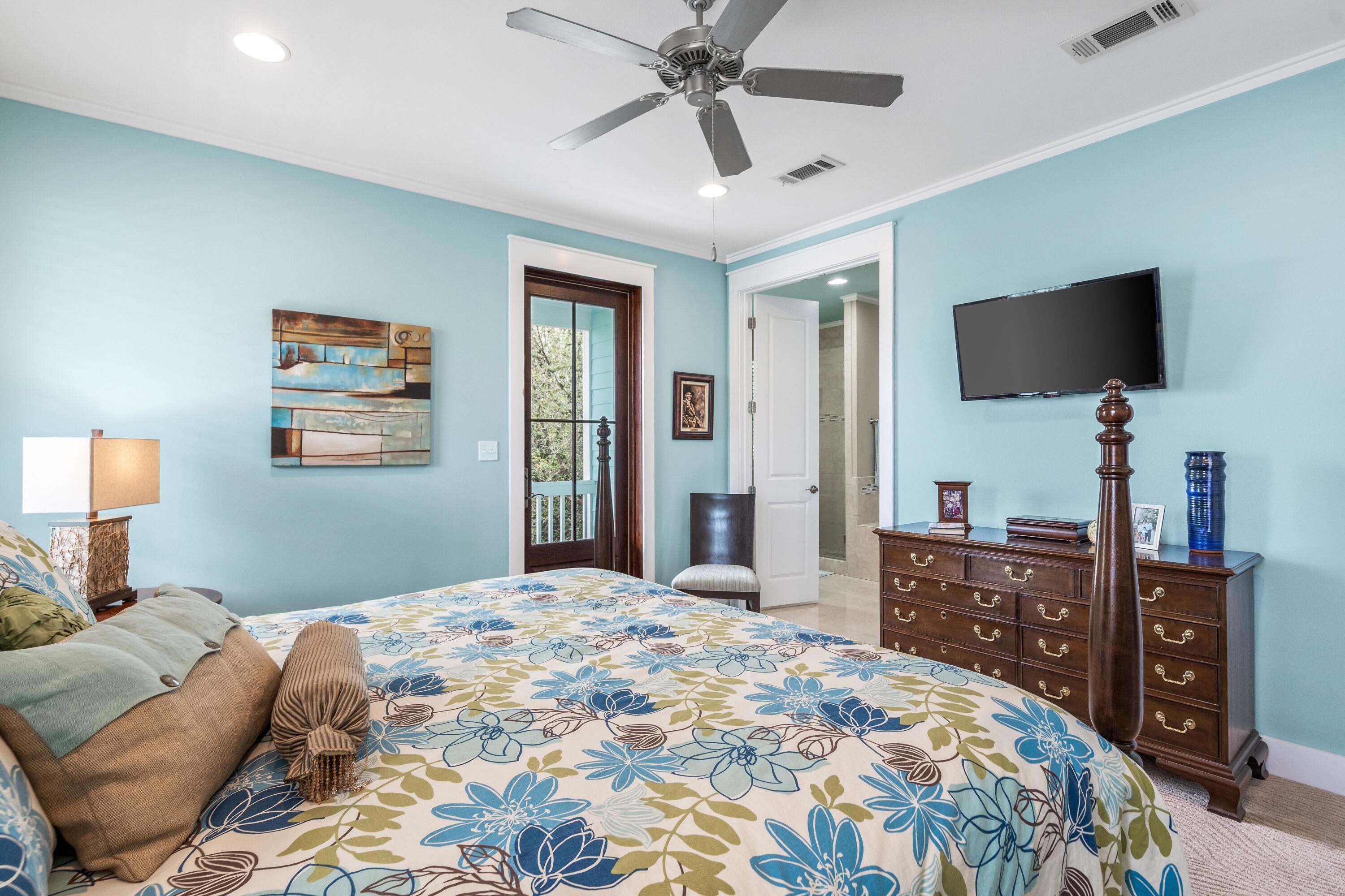 36 Moonlight Beach Lane Inlet Beach, FL 32461 - Photo 24 of 42 a bedroom with a bed and a flat screen tv