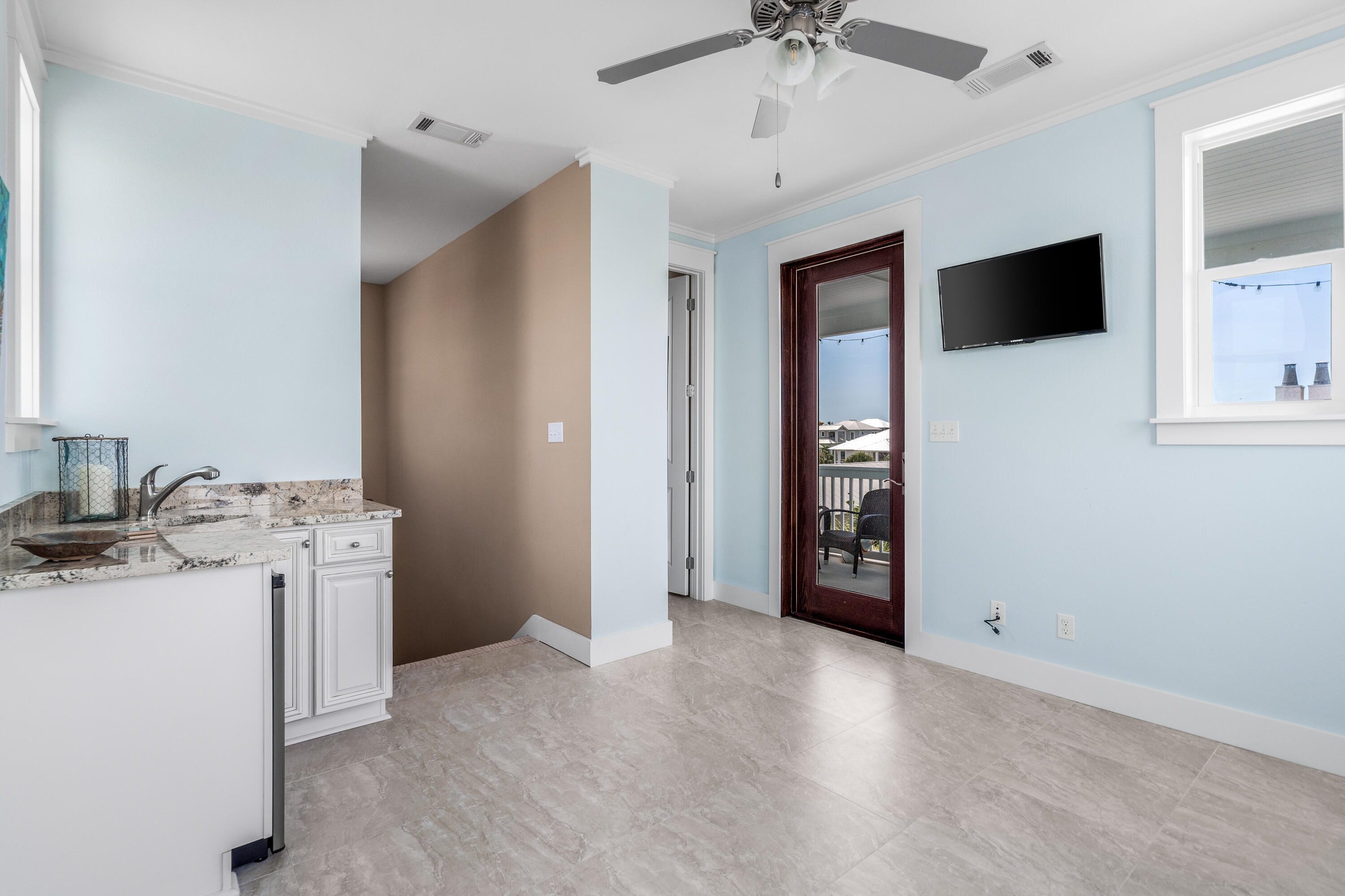 36 Moonlight Beach Lane Inlet Beach, FL 32461 - Photo 32 of 42 a view of a kitchen with a sink and a refrigerator