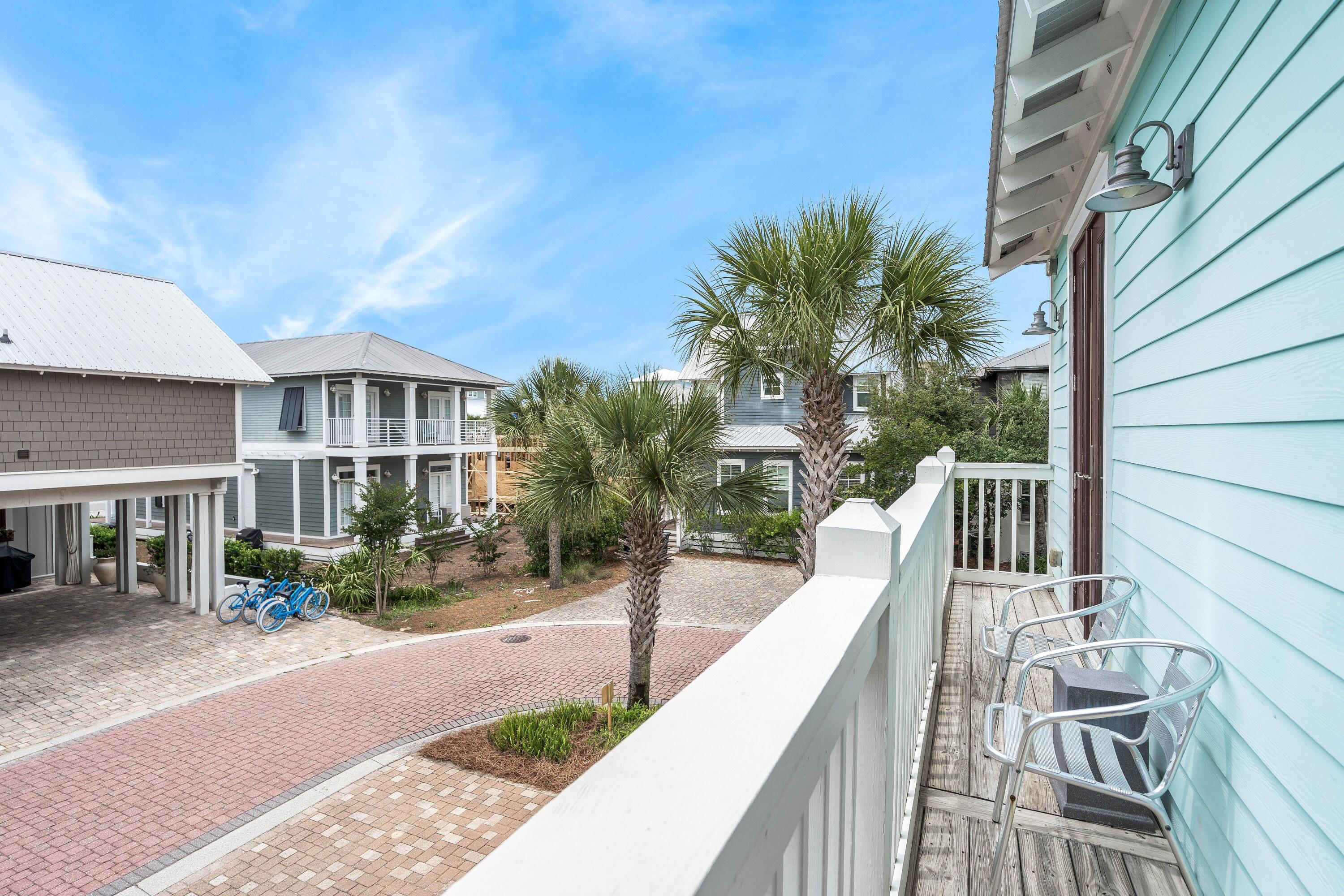 36 Moonlight Beach Lane Inlet Beach, FL 32461 - Photo 37 of 42 a view of a house with backyard and sitting area