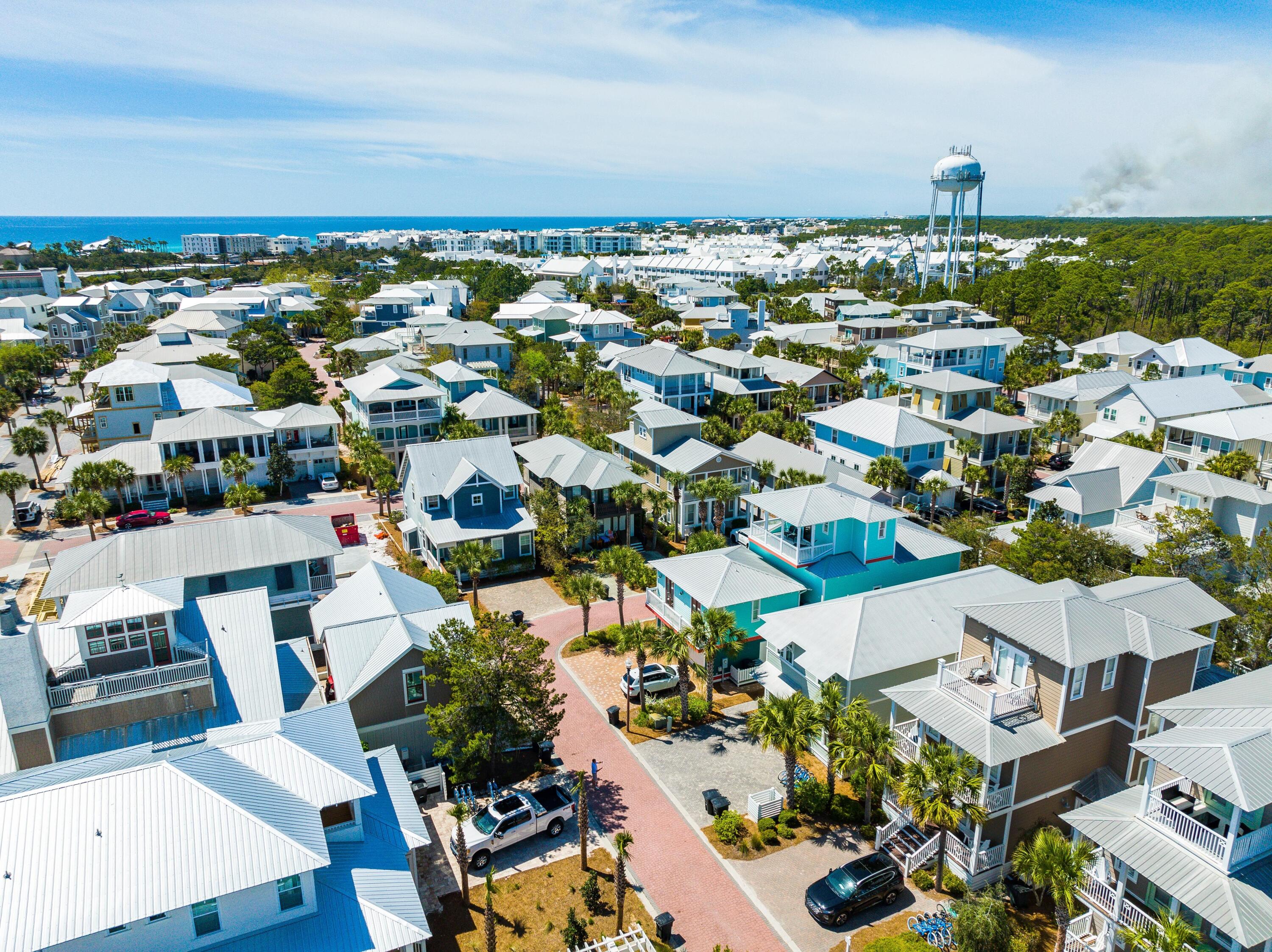 36 Moonlight Beach Lane Inlet Beach, FL 32461 - Photo 5 of 42 an aerial view of a building with an outdoor space and seating