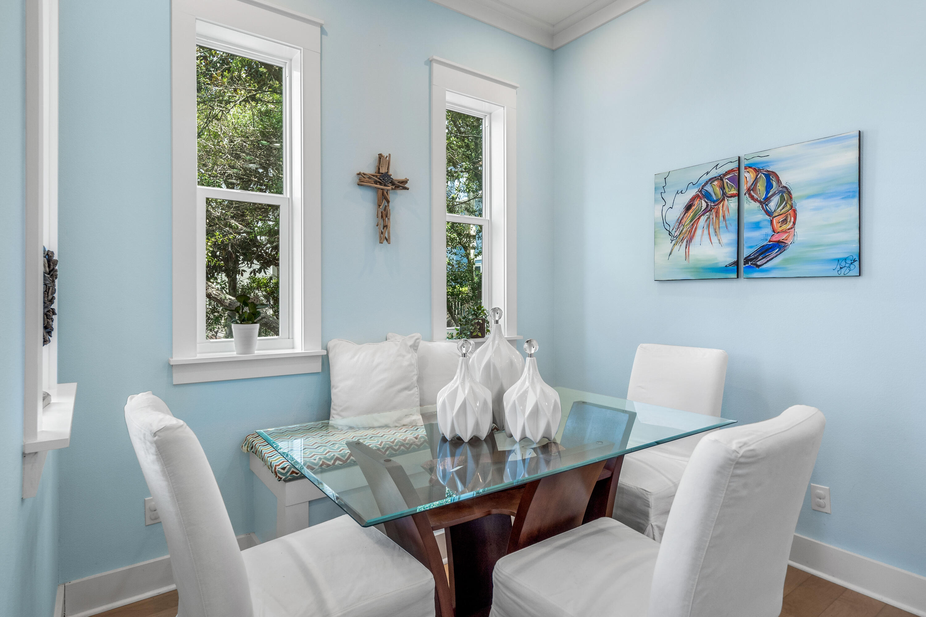 36 Moonlight Beach Lane Inlet Beach, FL 32461 - Photo 9 of 42 a view of a dining room with furniture a rug and wooden floor